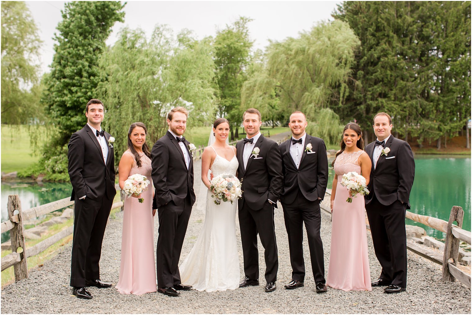 Classic black tie wedding with pink bridesmaid dresses | Photos by Idalia Photography