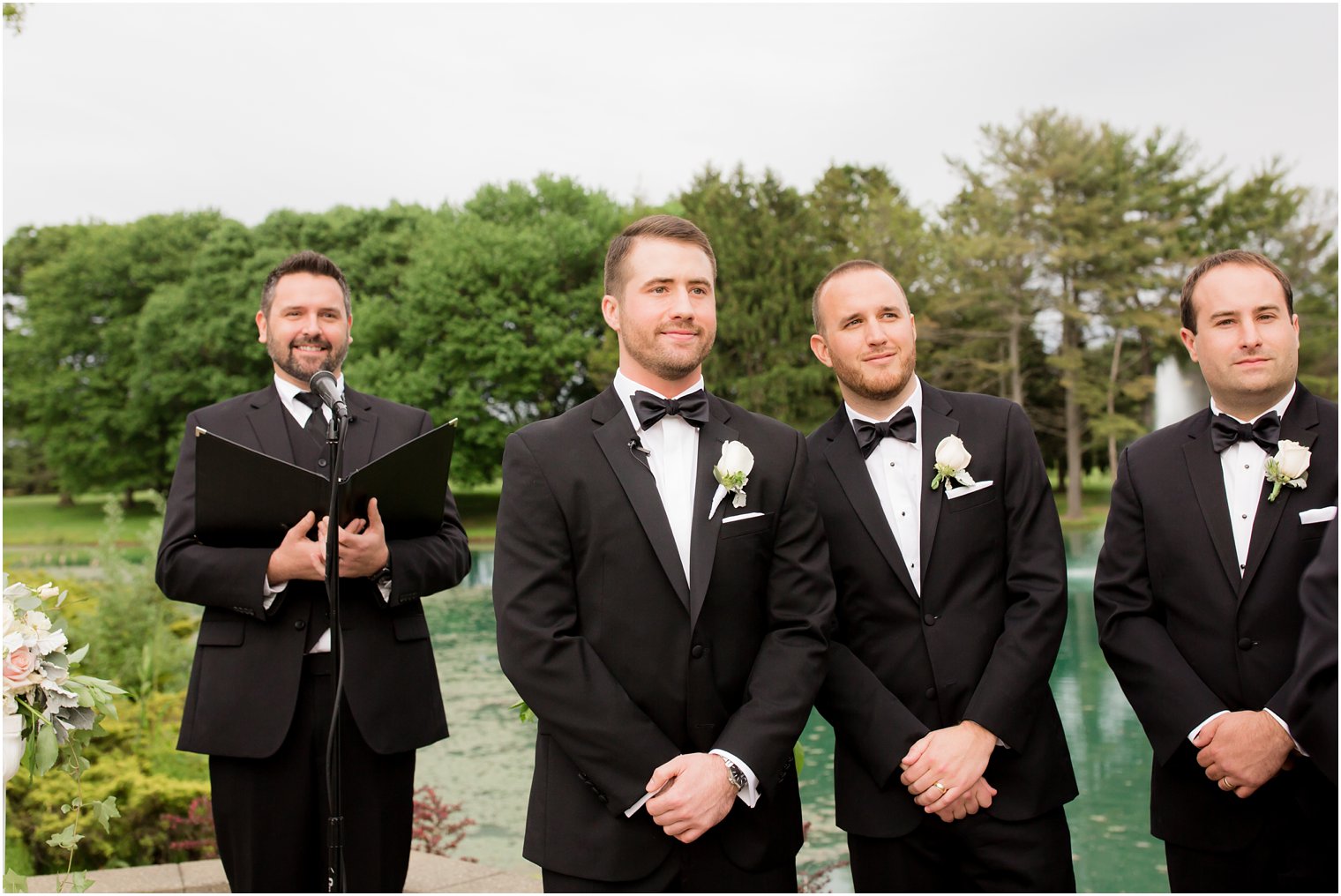 Groom during processional at Windows on the Water at Frogbridge Wedding | Photos by Idalia Photography
