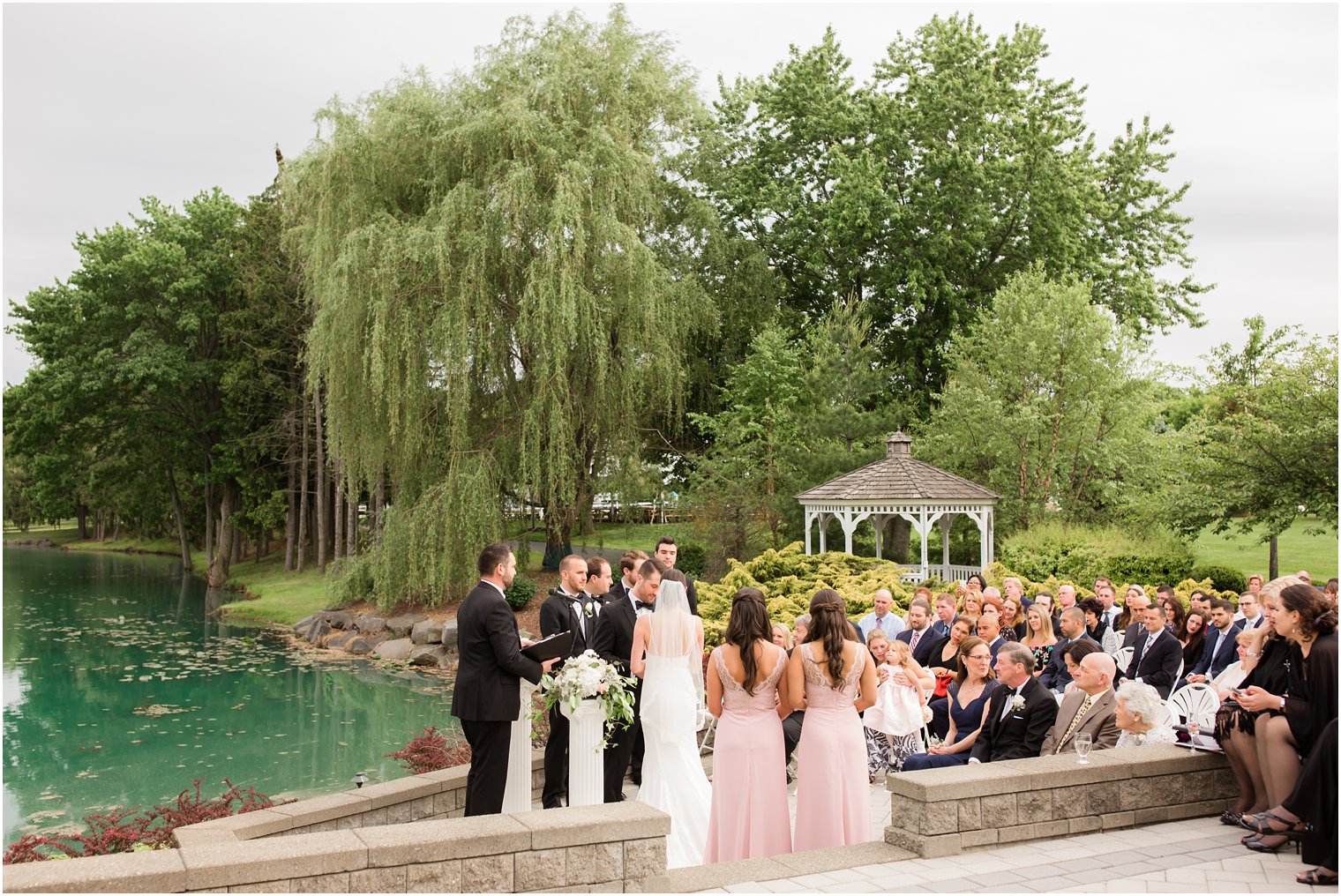 Outdoor ceremony at Windows on the Water at Frogbridge | Photos by Idalia Photography