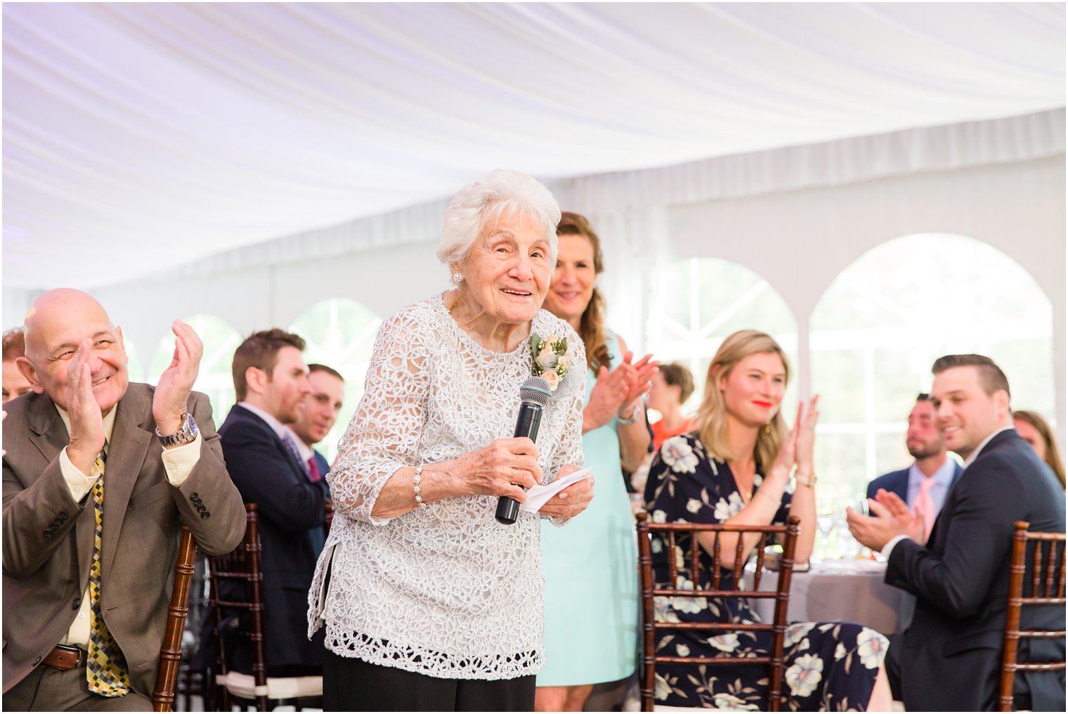 Grandmother toasting to newlyweds | Photo by Idalia Photography