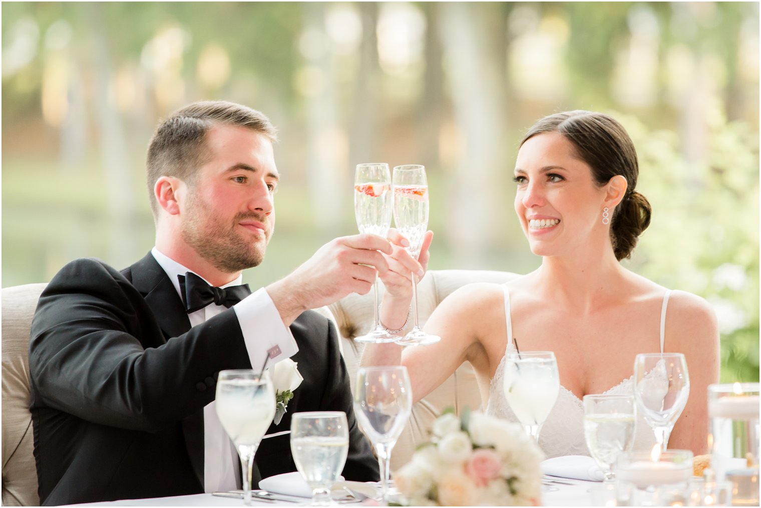 Bride and groom toasting | Idalia Photography