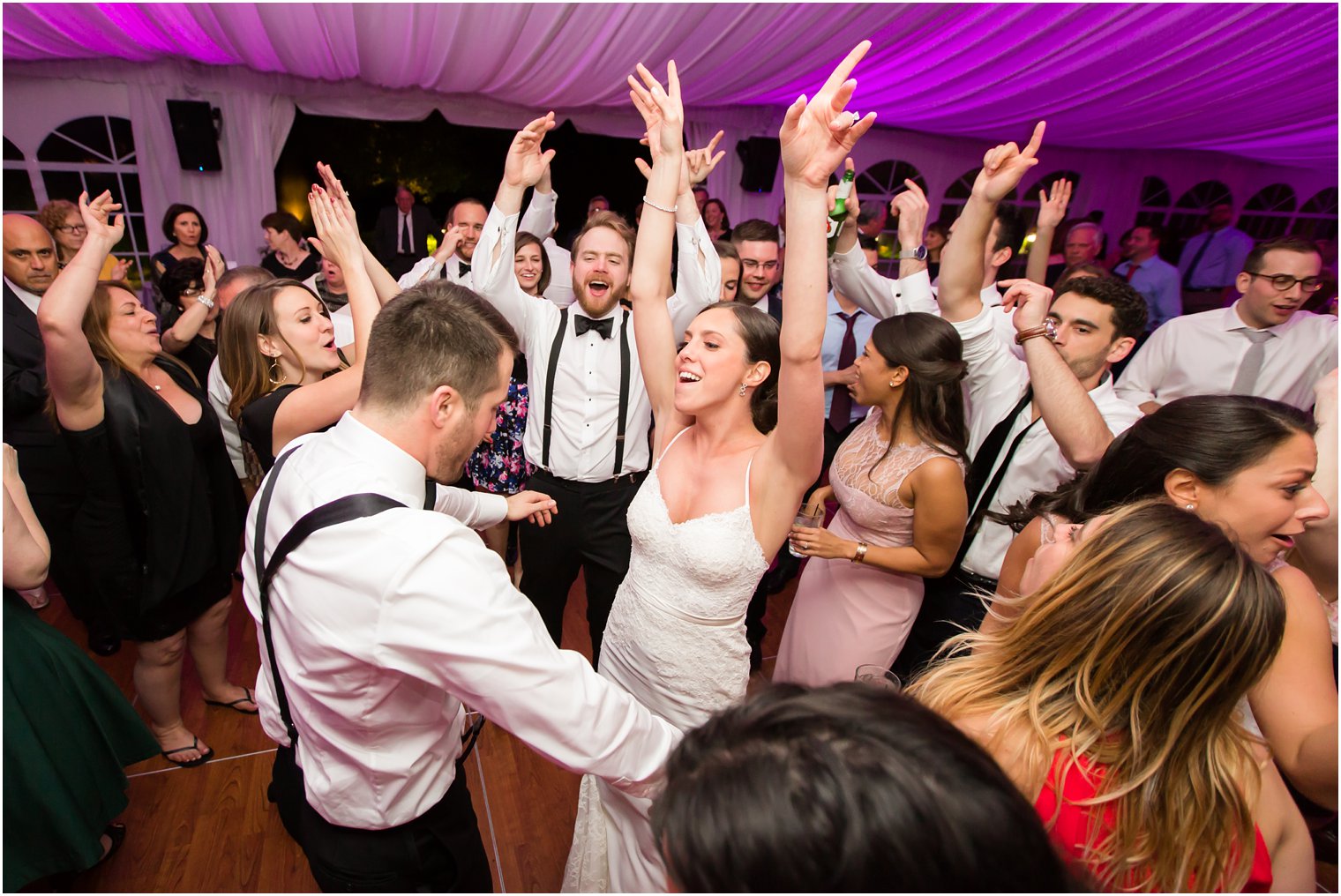 Reception dancing at tented reception wedding | Photo by Idalia Photography