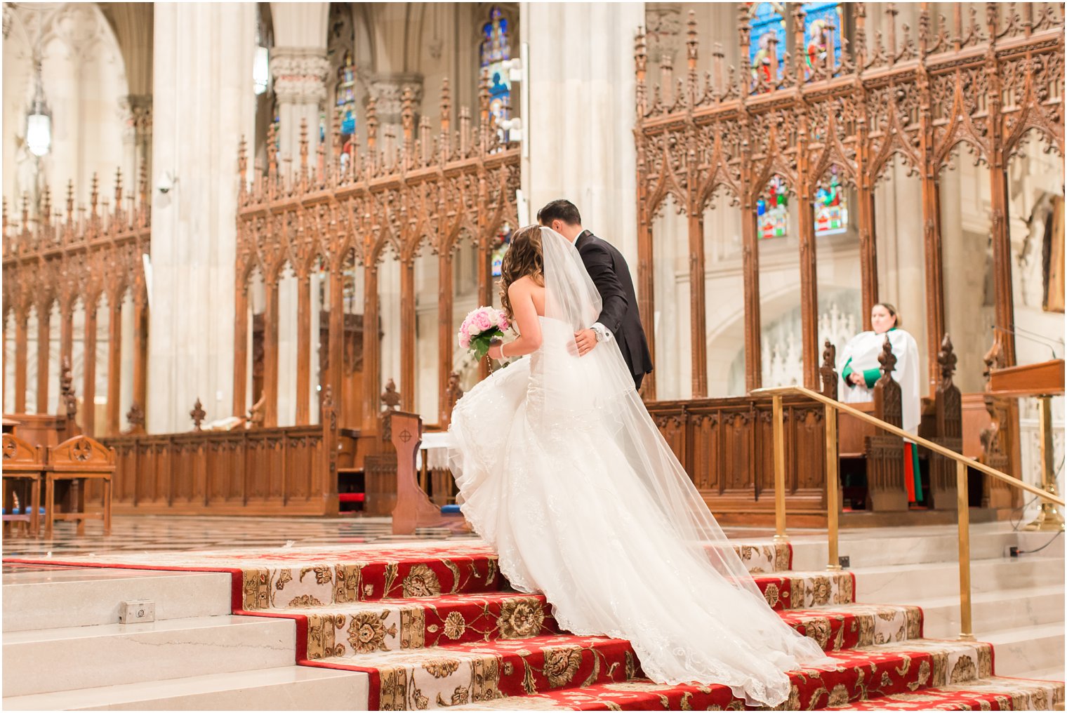 Bride and groom at altar at St. Patrick's Cathedral Wedding | Photo by Idalia Photography