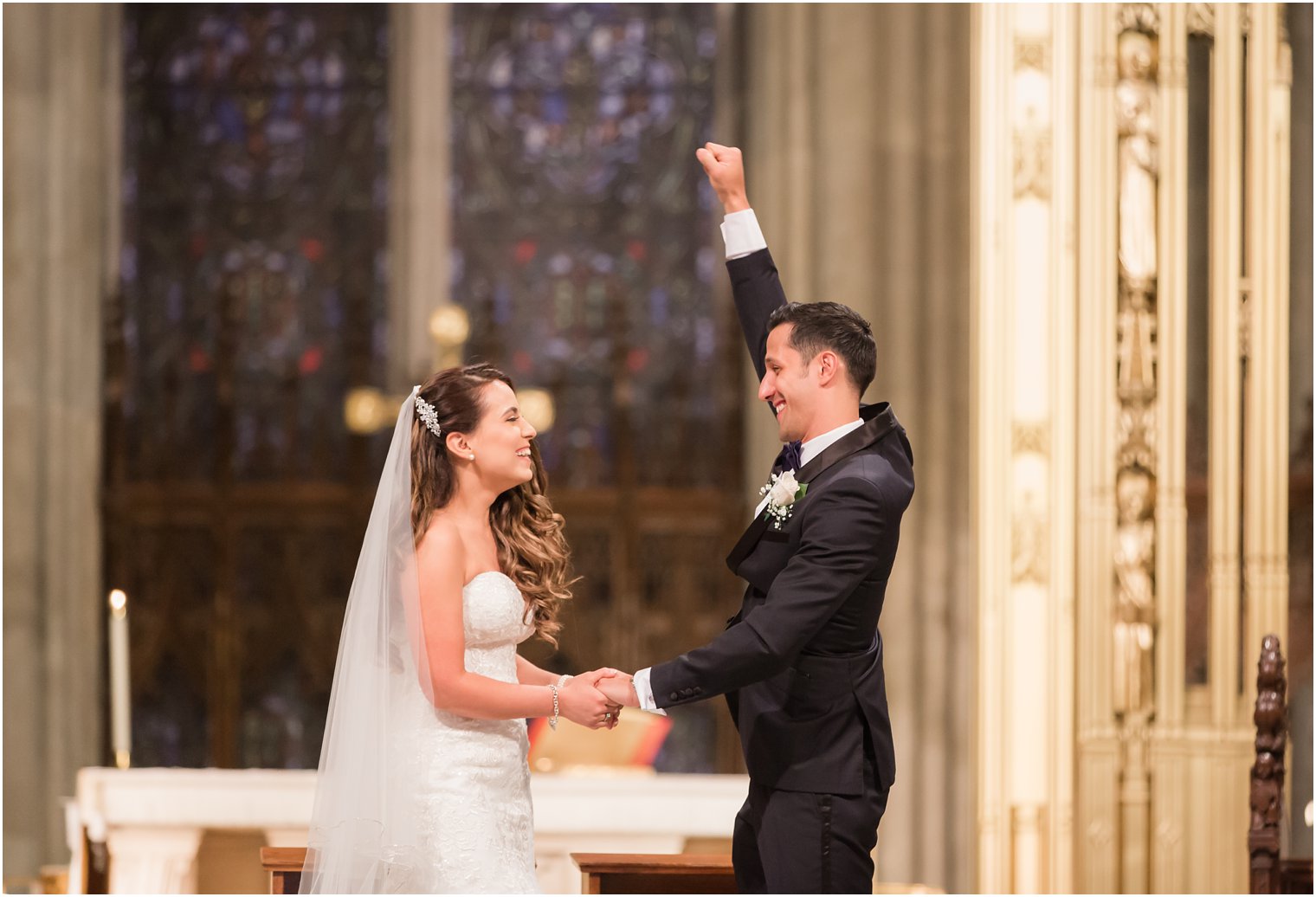 Joyful bride and groom at St. Patrick's Cathedral | Photo by Idalia Photography