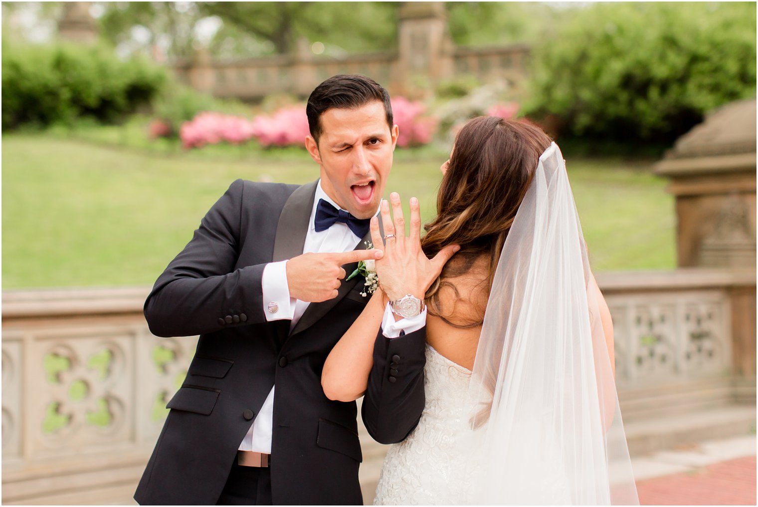 Cute groom just married pose | Photo by Idalia Photography