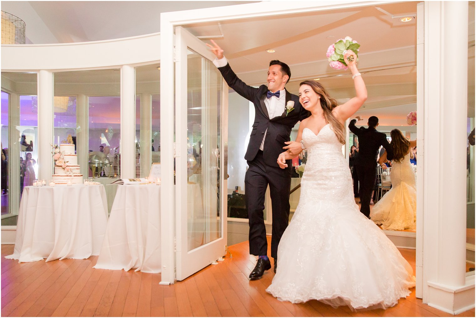 Bride and groom entrance into reception | Photos by Idalia Photography