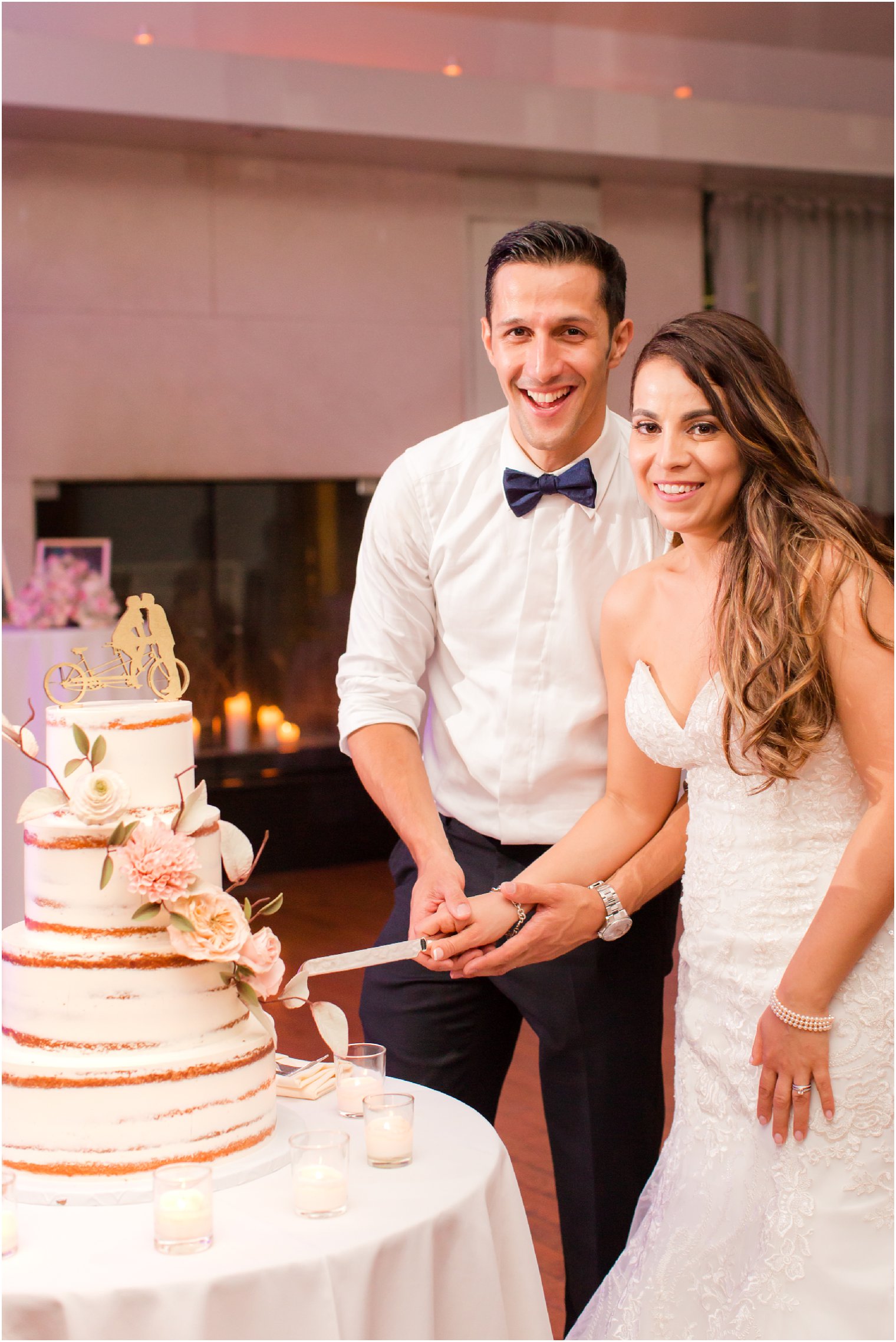 Bride and groom cutting their wedding cake at Battery Gardens | Photo by Idalia Photography