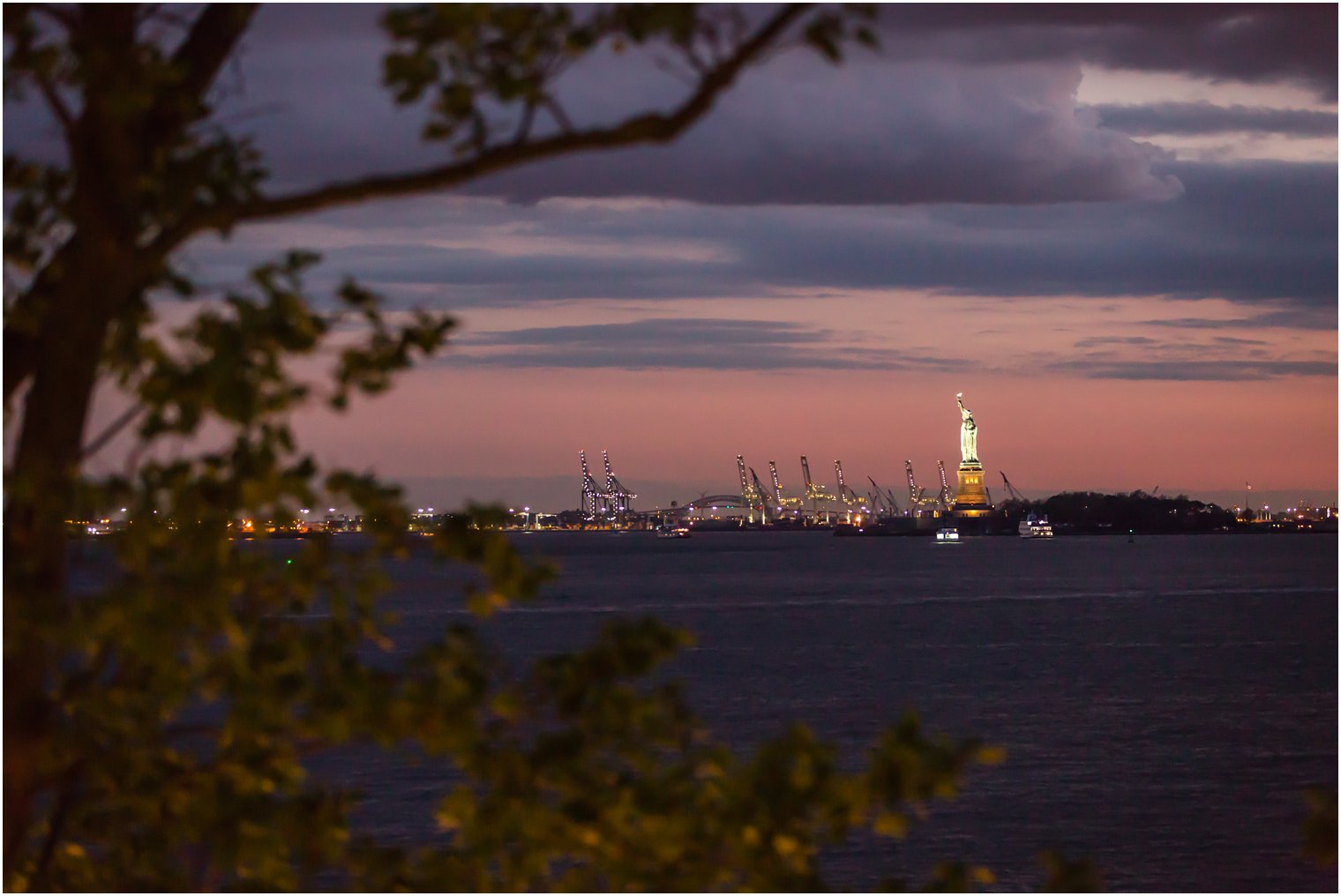 View of Statue of Liberty from Battery Gardens | Photo by Idalia Photography