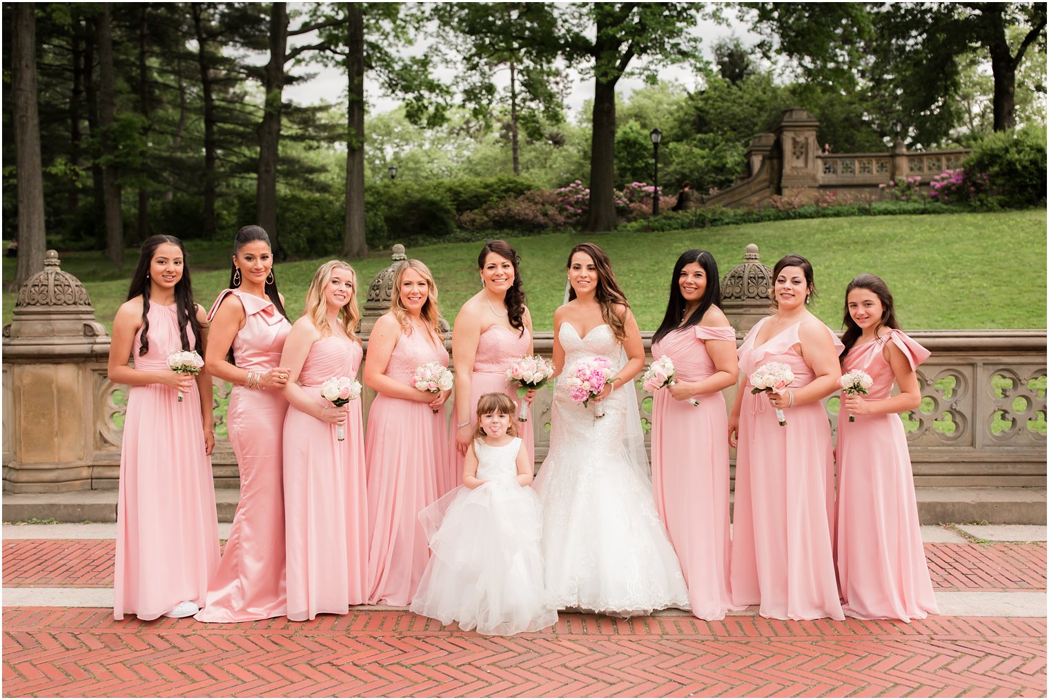 Bridesmaids in pink Dessy dresses | Photo by Idalia Photography