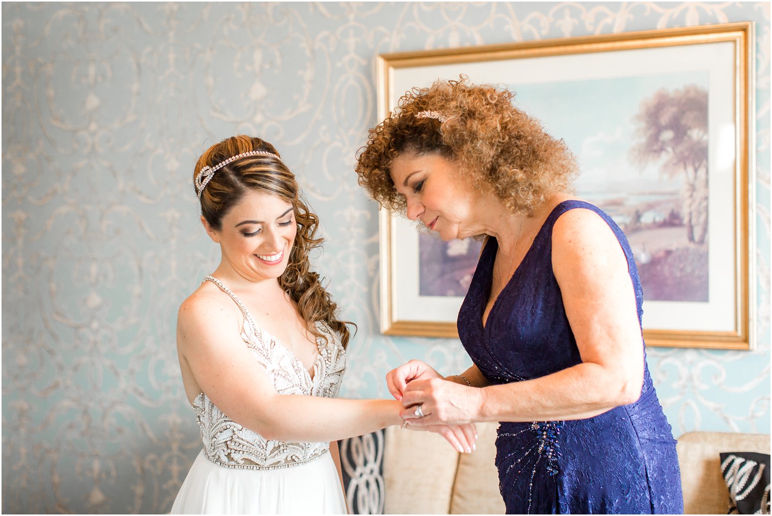 Bride getting ready with her mother