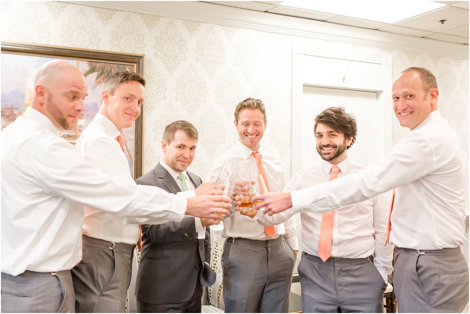 Groomsmen in gray and peach