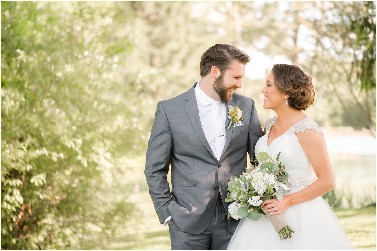 Smiling bride and groom after ceremony at Windows on the Water at Frogbridge Wedding