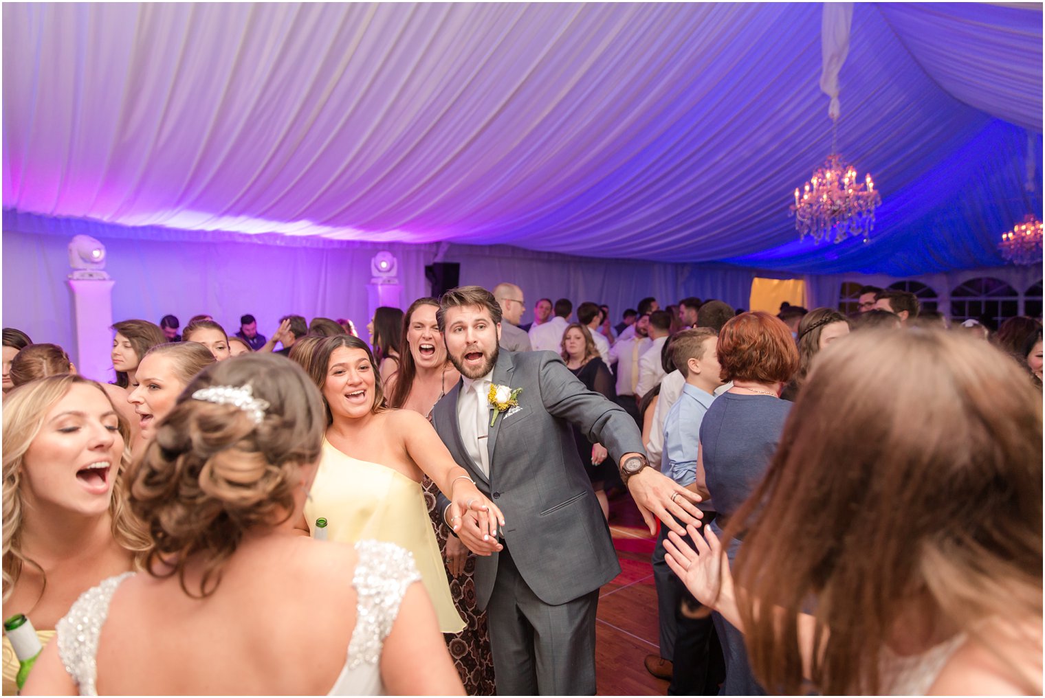 Candid photos of guests at Windows on the Water at Frogbridge Wedding Reception