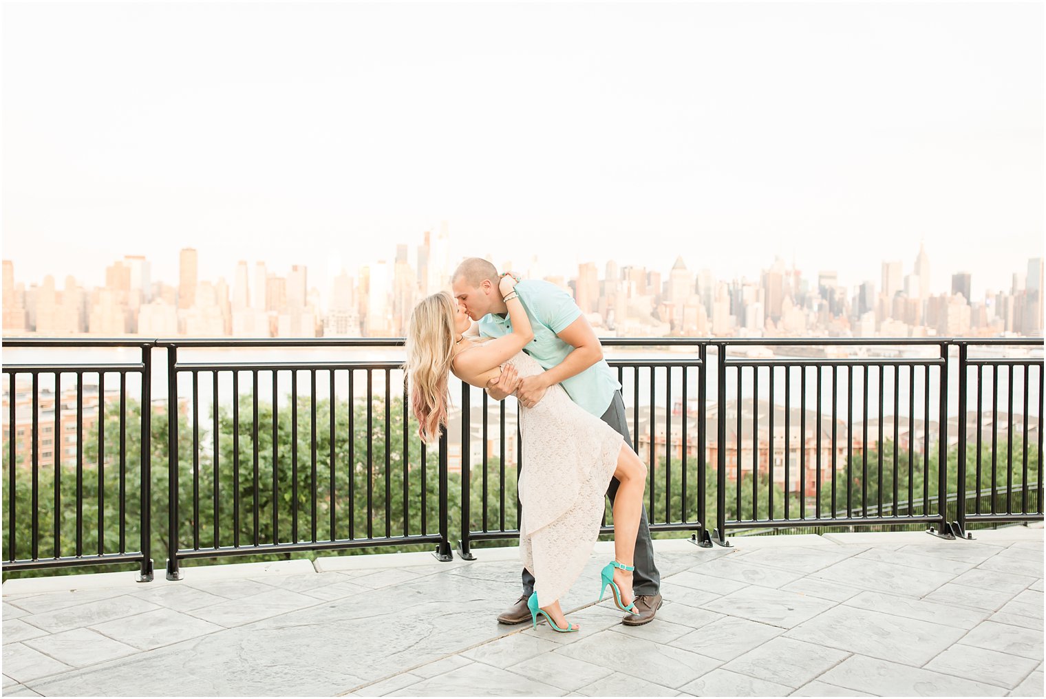 Engagement photo with NYC backdrop