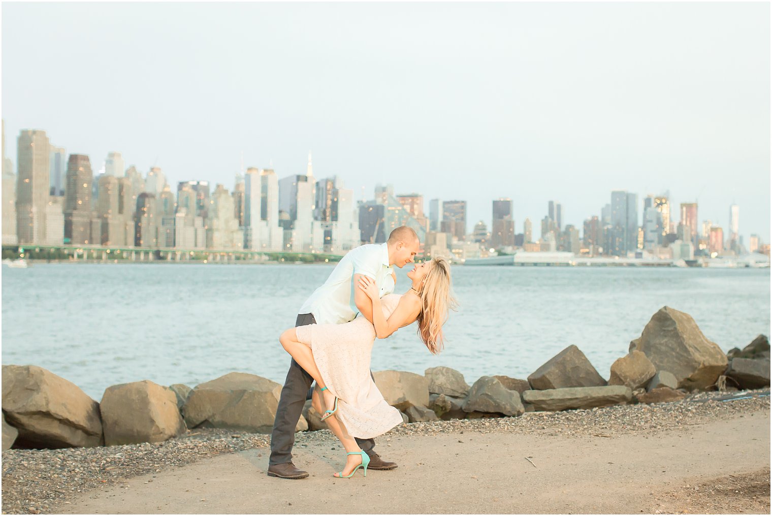 Engagement photo with NYC backdrop