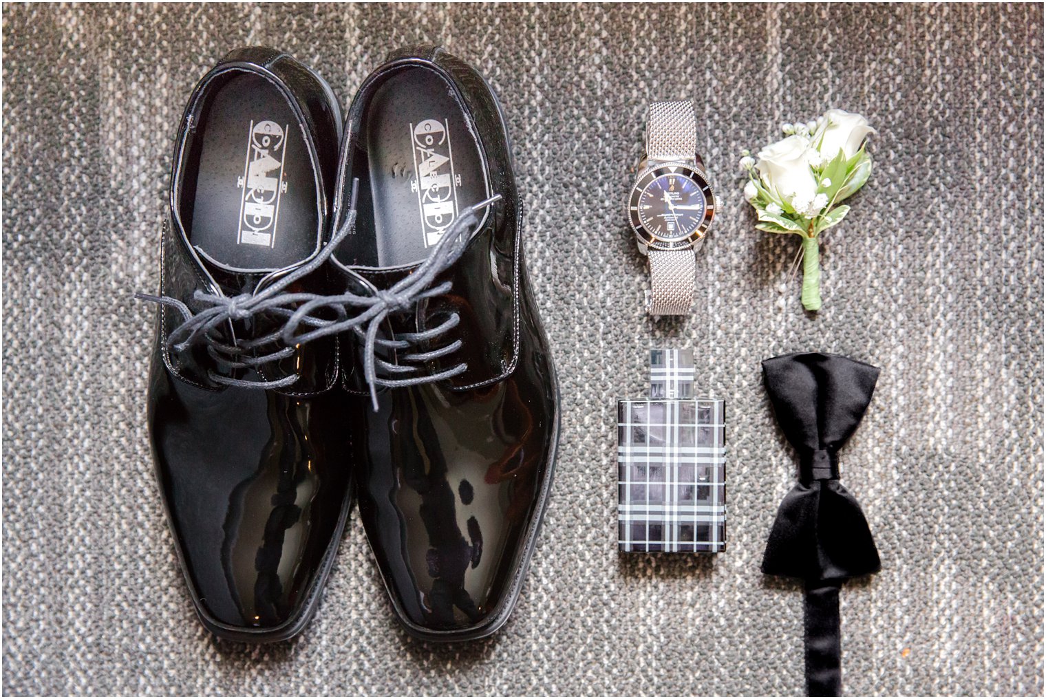 Groom shoes and accessories on wedding day