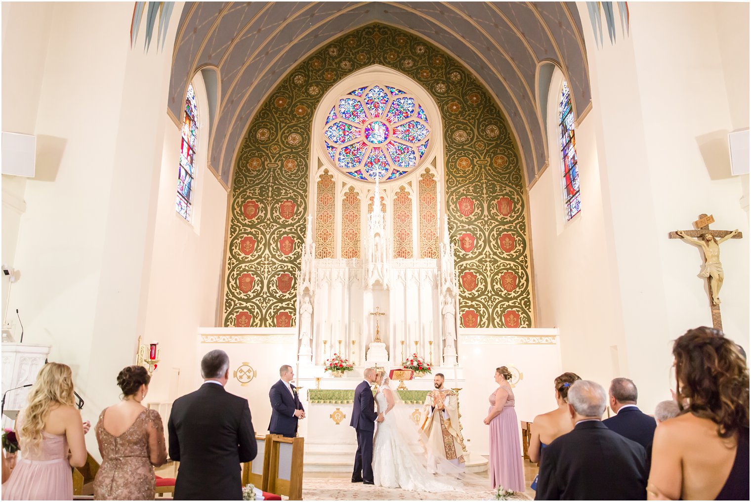 Wedding ceremony first kiss at Our Lady by the Sea in Long Branch, NJ