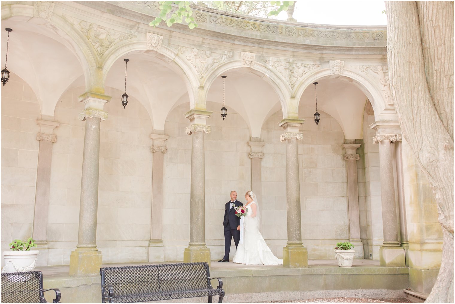 Walking photo of bride and groom at Monmouth University