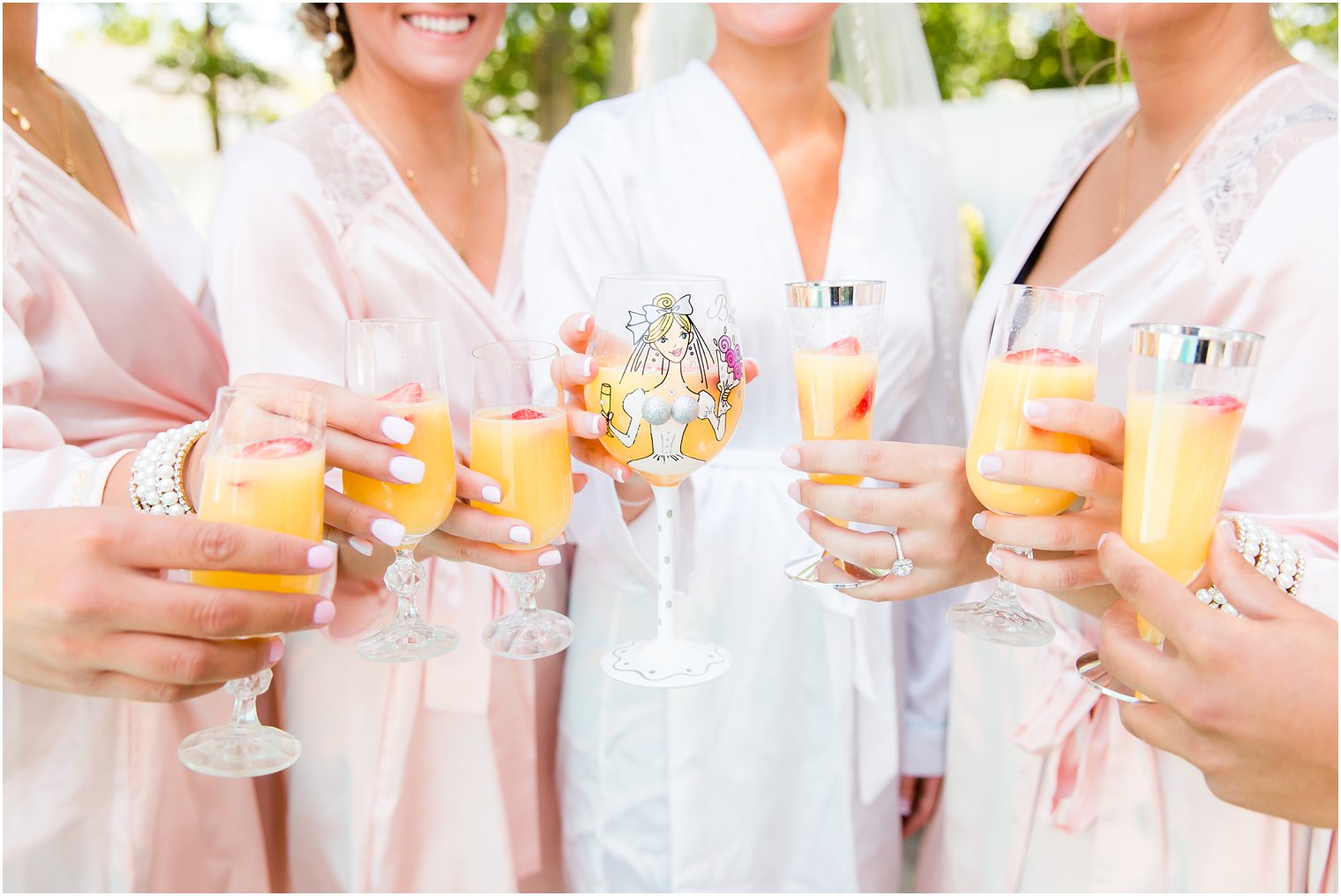 The Sunset Ballroom at Jack Baker's Lobster Shanty Wedding | Custom bride champagne glass