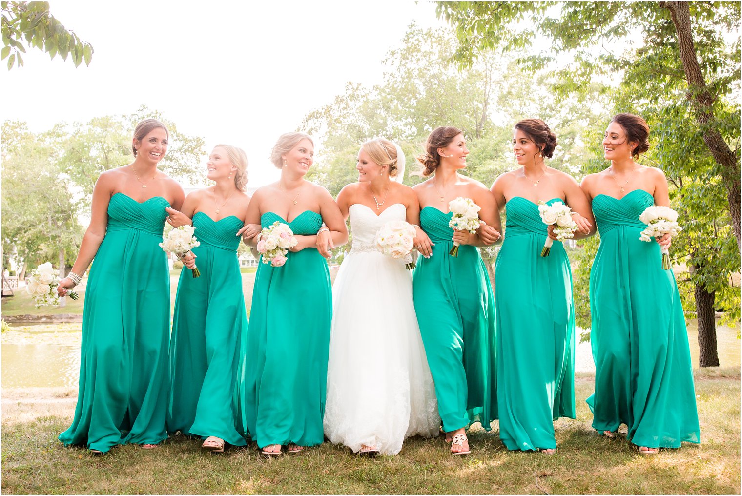 The Sunset Ballroom at Jack Baker's Lobster Shanty Wedding | Bridesmaids in turquoise