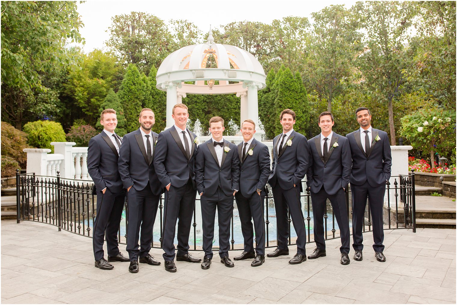 Classic groomsman photo in blue tuxedos