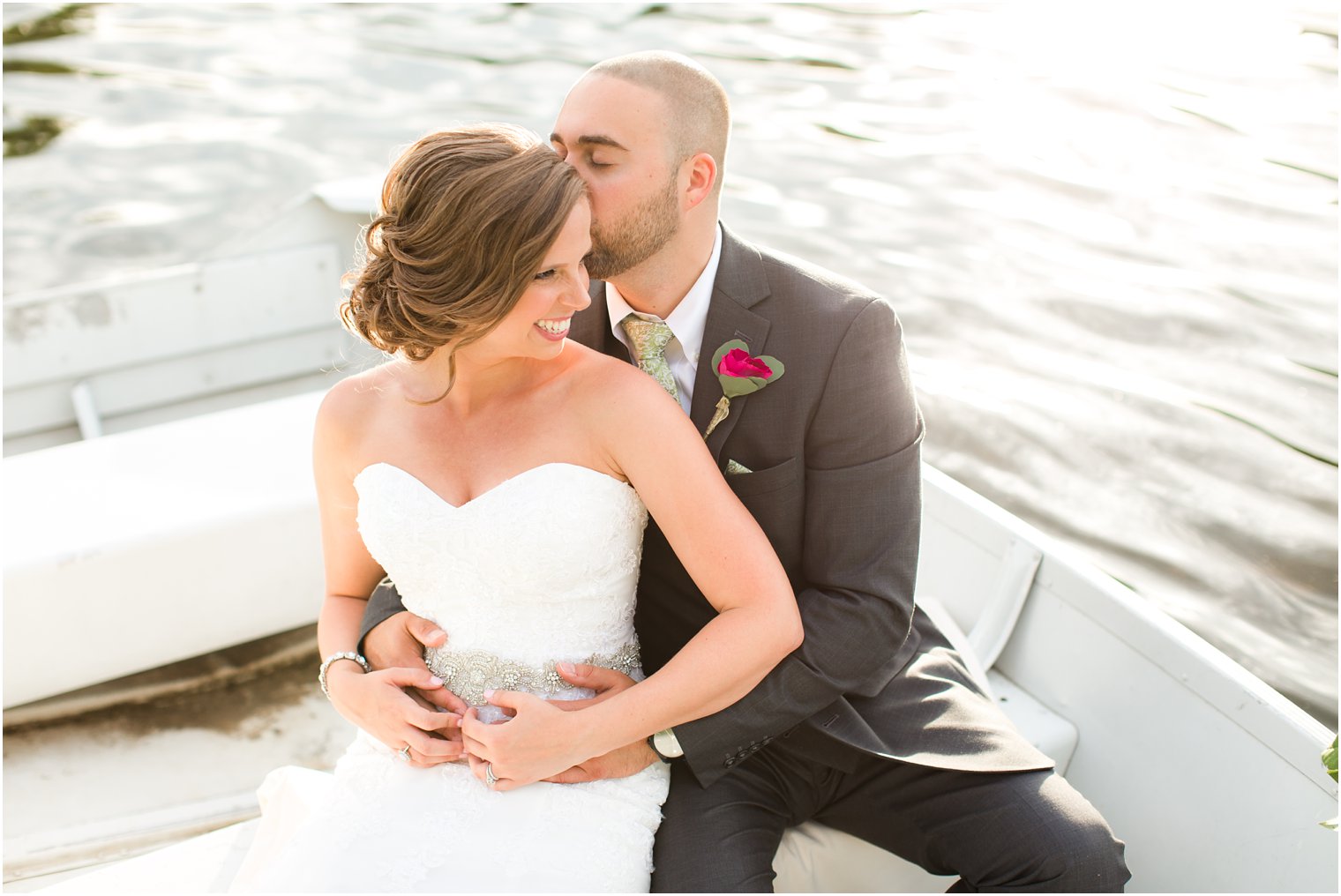 Wedding photo on rowboat at Lake Valhalla Club