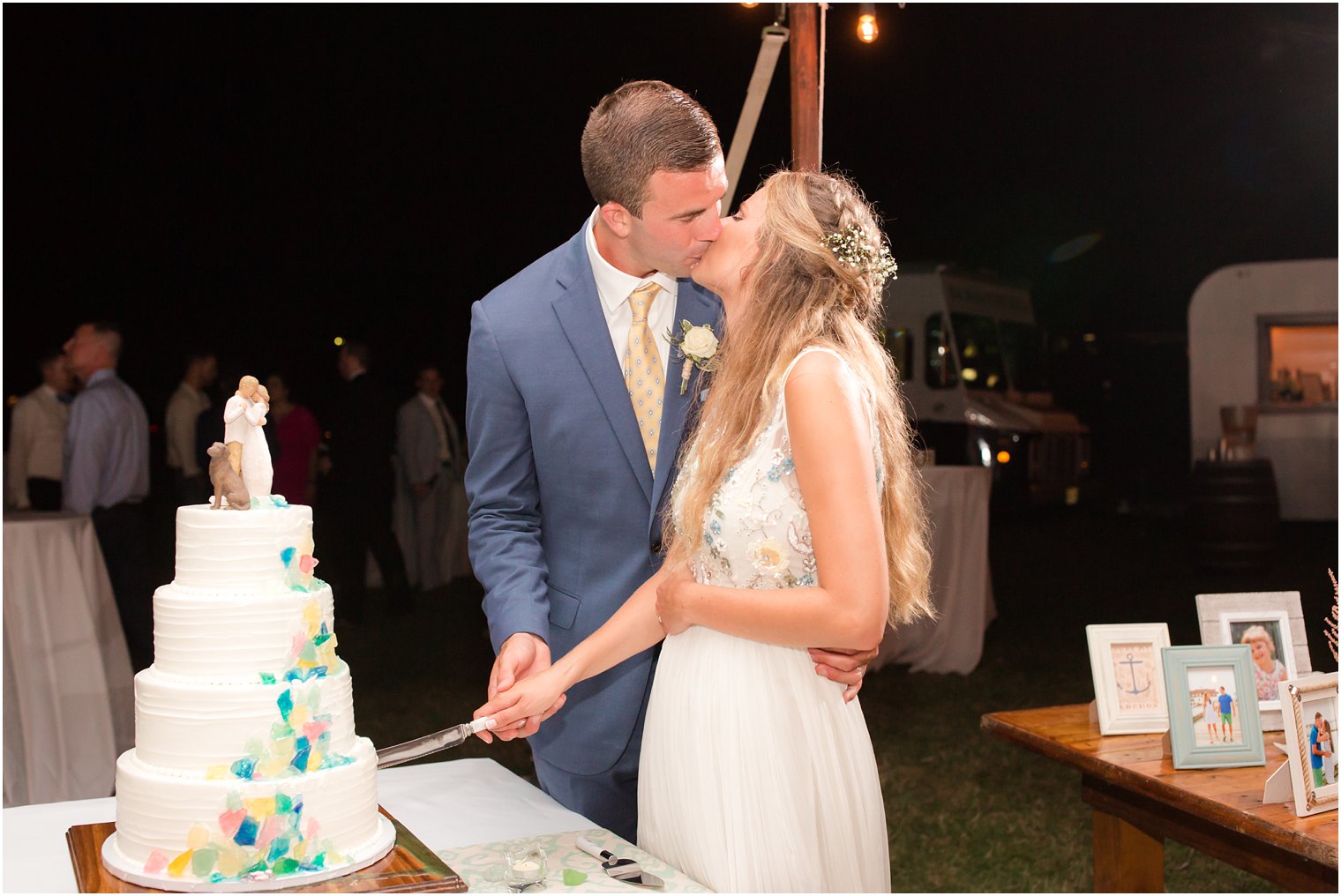 Bride and groom cutting cake