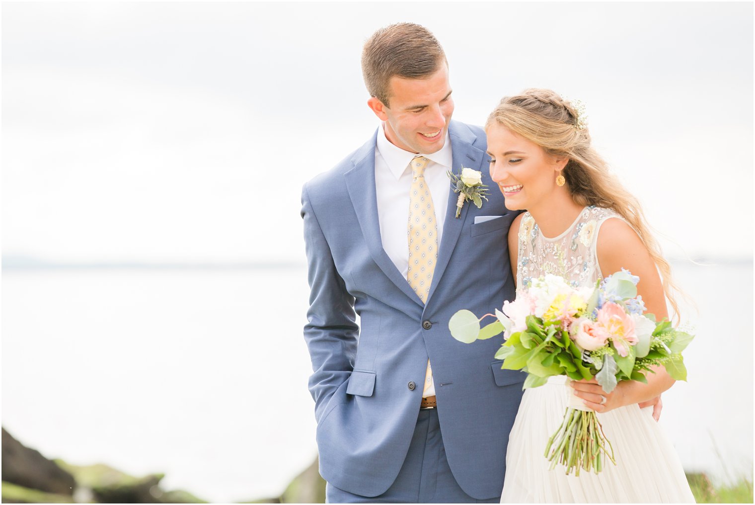 Candid photo of bride and groom | Sandy Hook Chapel NJ Wedding