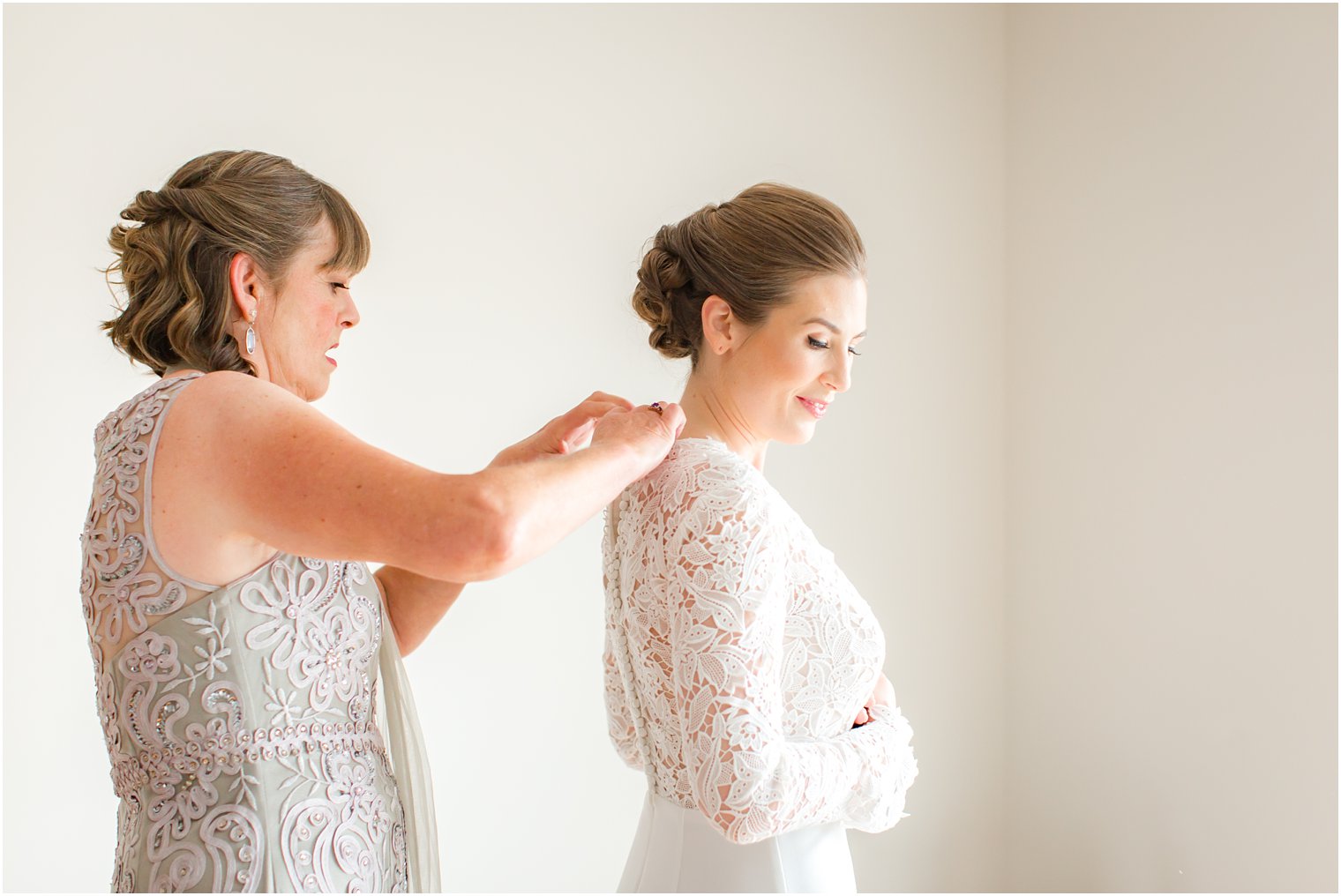 Bride and mother on wedding morning