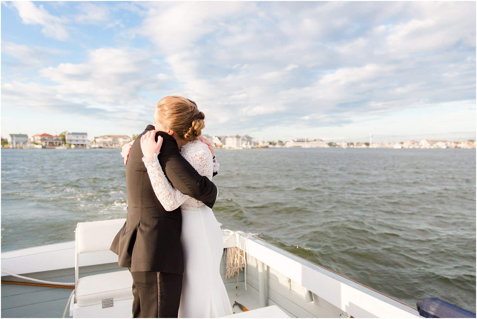 Bay Head Yacht Club Wedding Photos of bride and groom on a boat