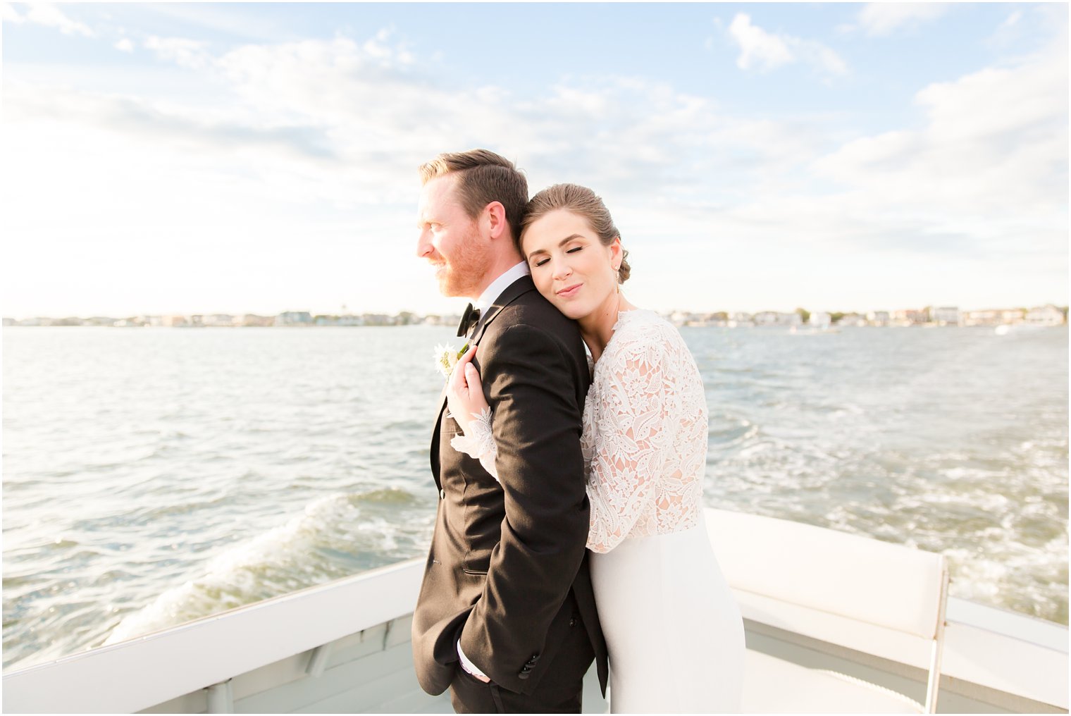 Bay Head Yacht Club Wedding Photos of bride and groom on a boat