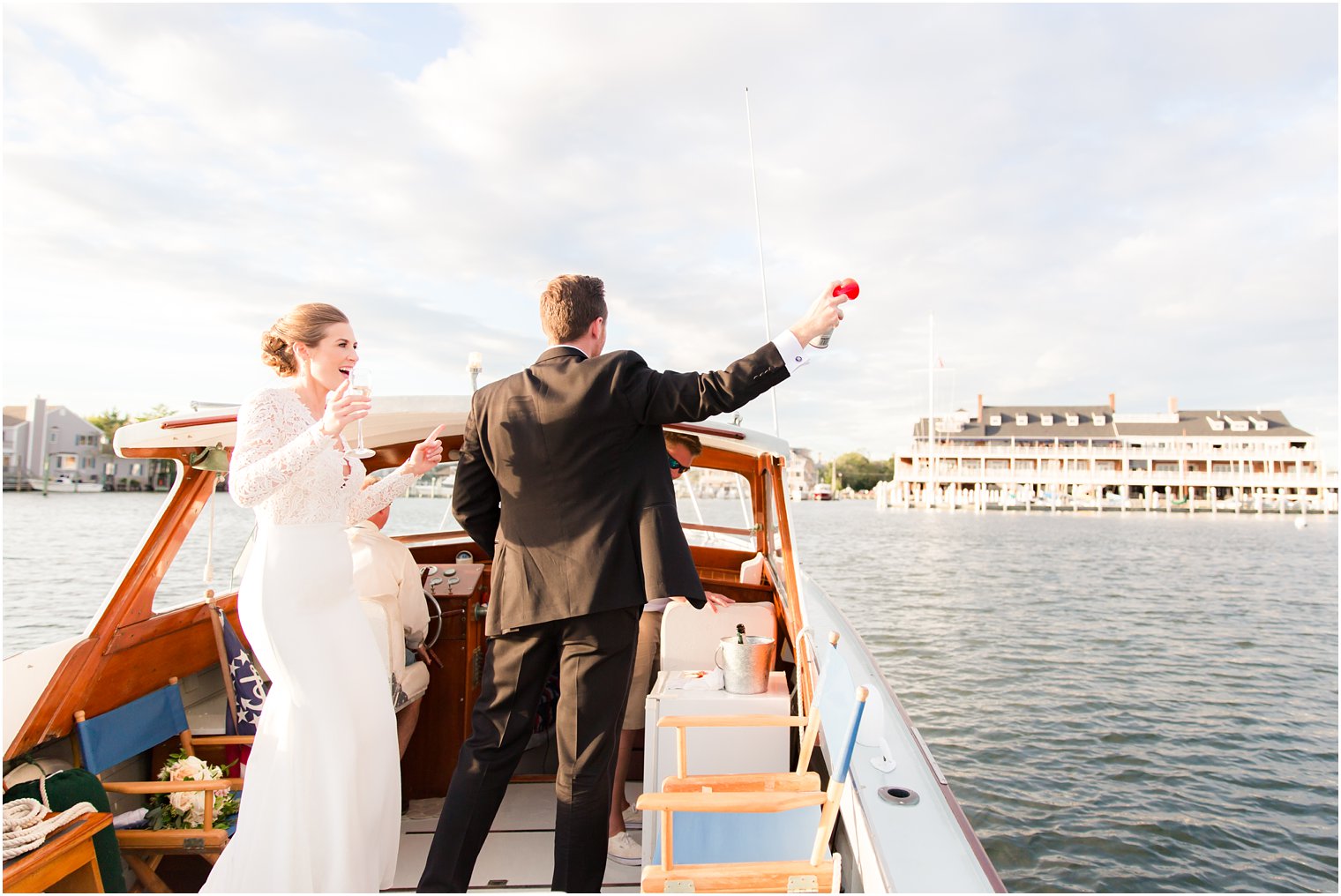 Bay Head Yacht Club Wedding Photos of bride and groom on a boat