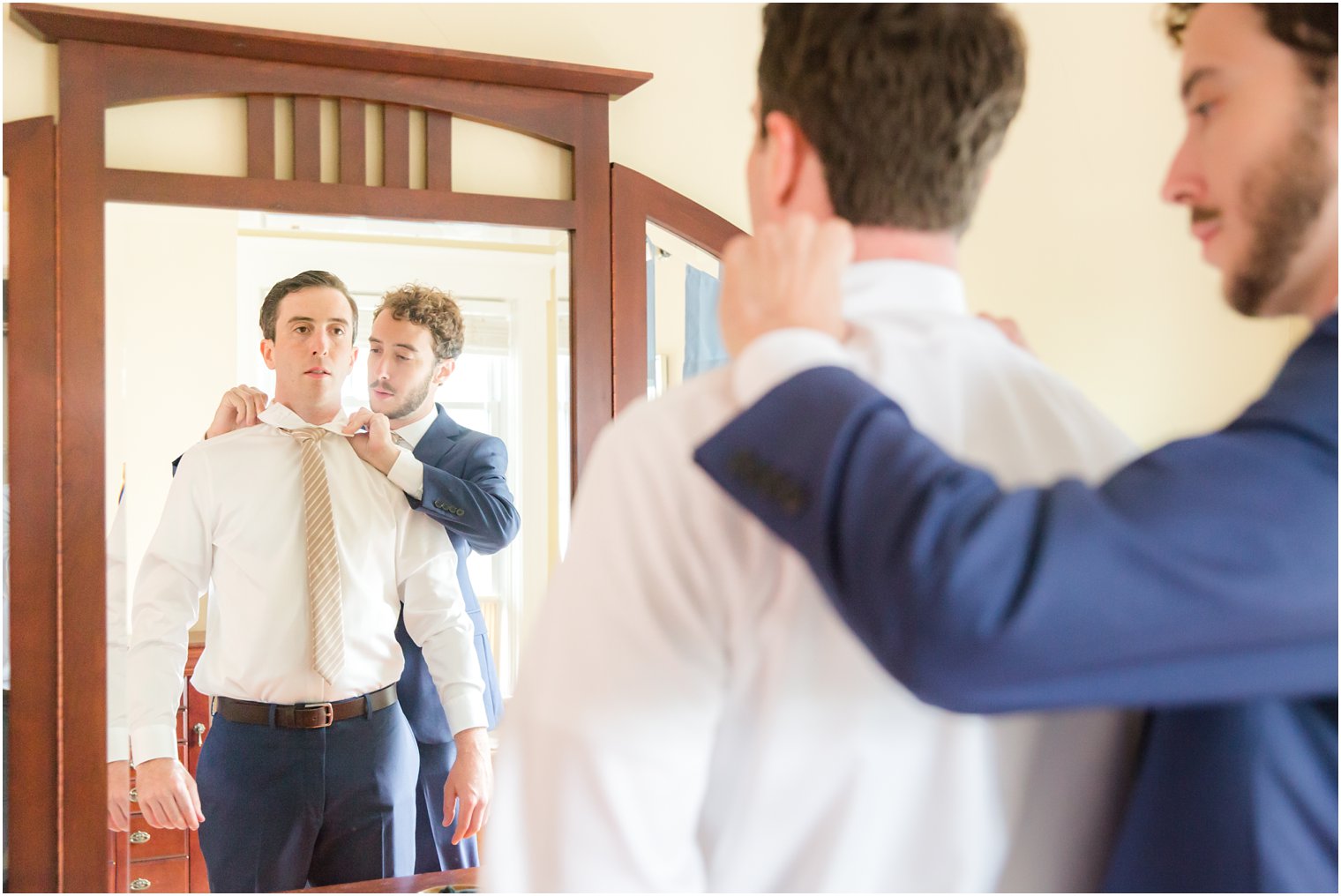 Groom prep photos at McLoone's Pier House Wedding