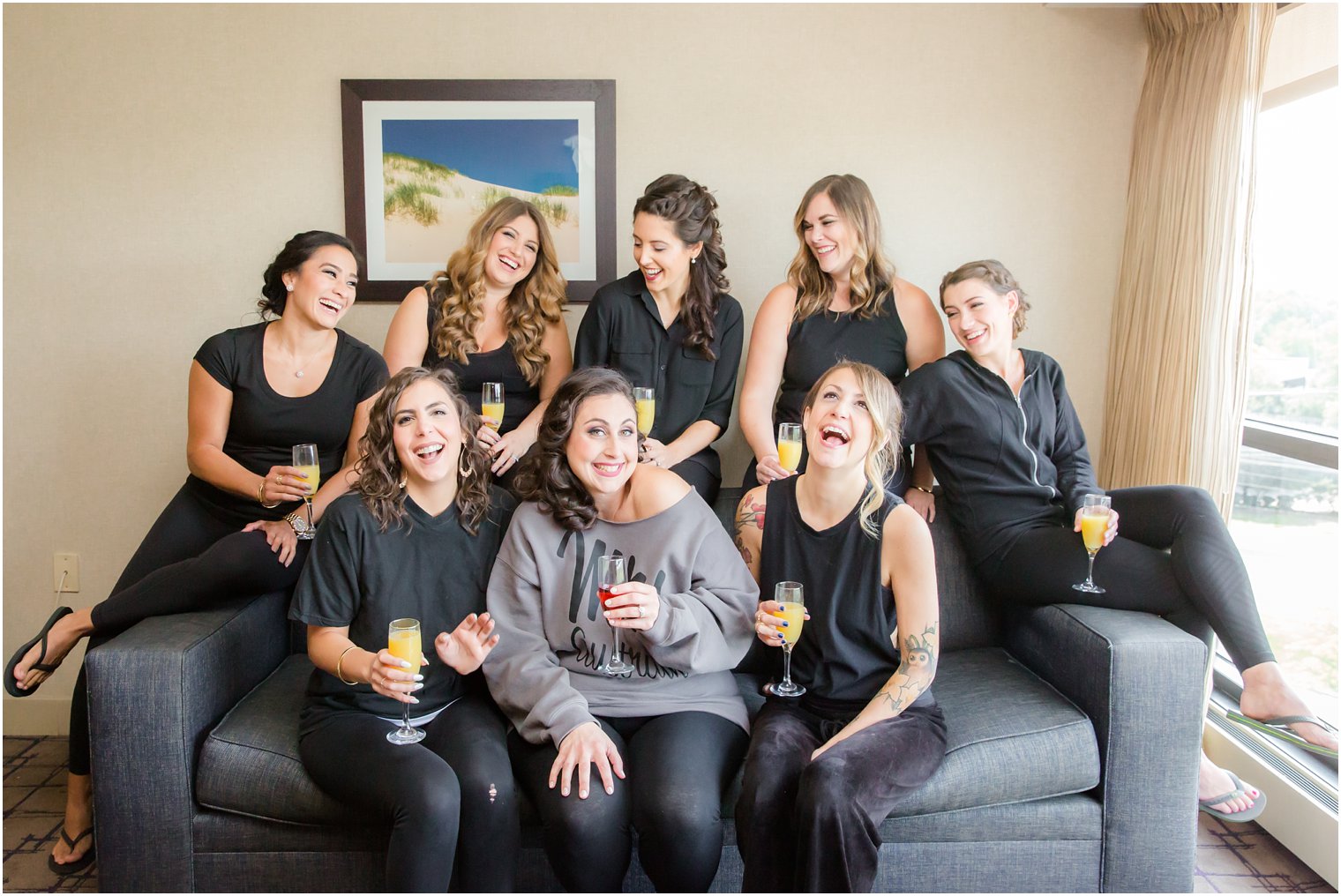 Bridesmaids in Sheraton Eatontown lounge by Shadowbrook Wedding Photographers Idalia Photography