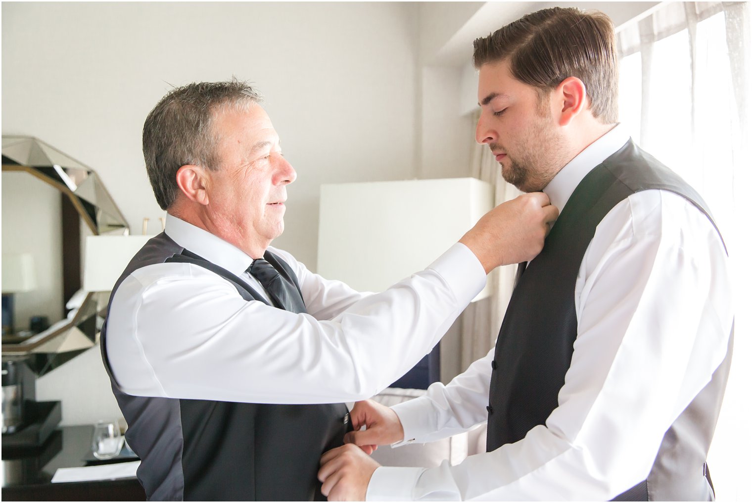 Groom prep by Shadowbrook Wedding Photographers Idalia Photography