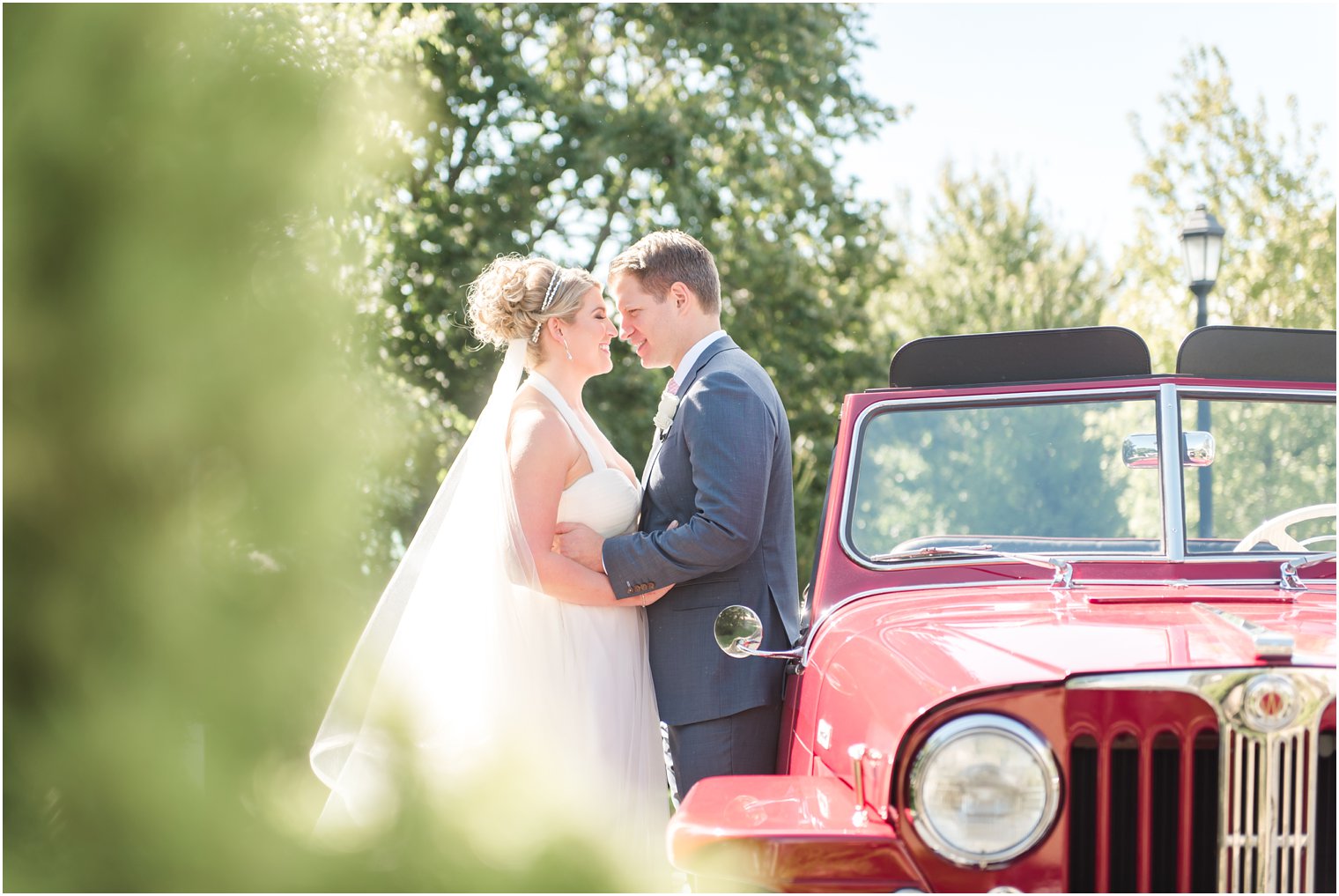 Sweet moment between bride and groom at Windows on the Water at Frogbridge Wedding