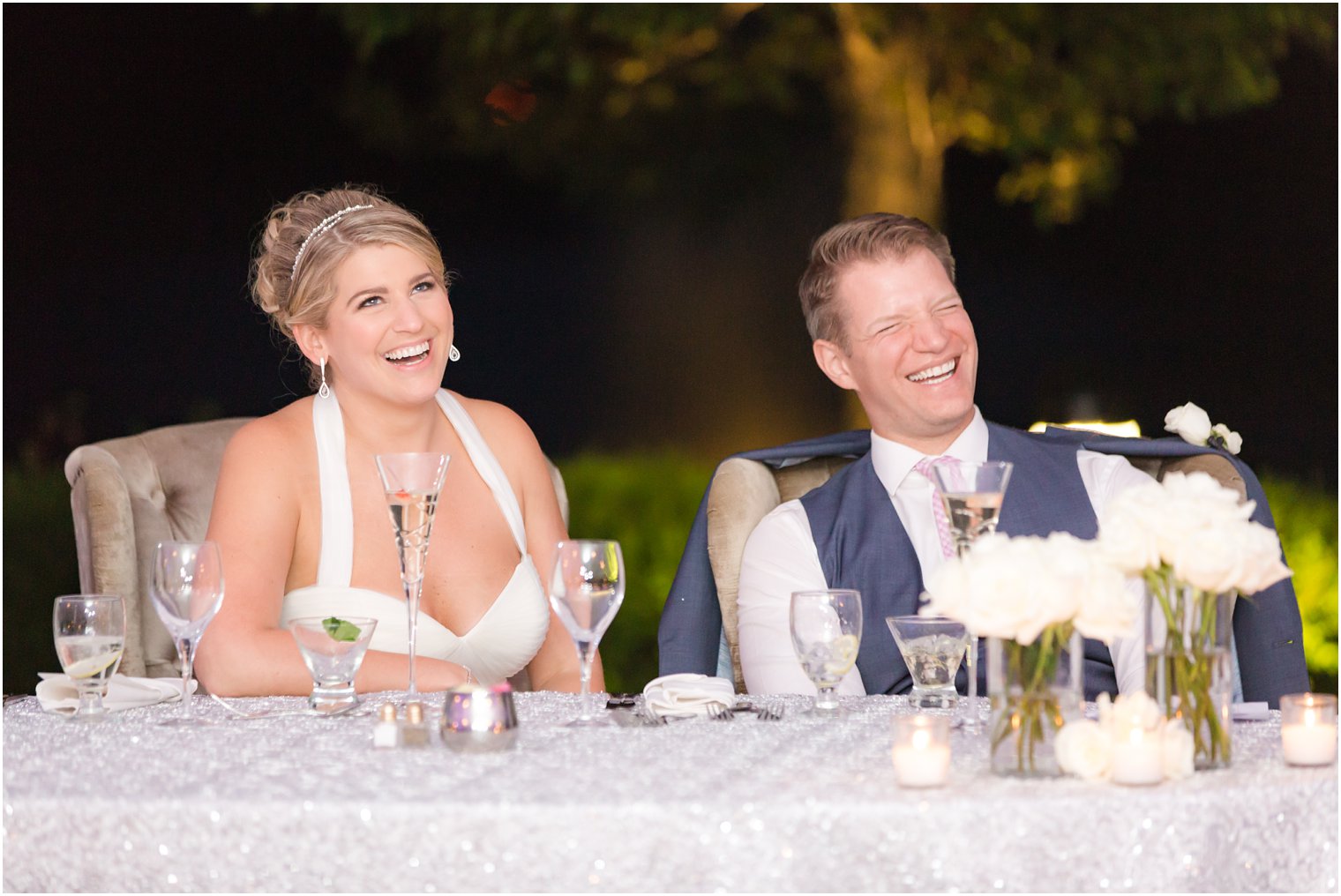 Fun bride and groom reaction at Windows on the Water at Frogbridge tented wedding reception