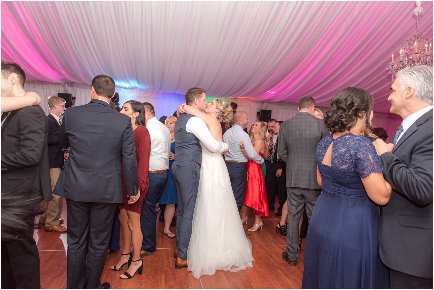 Bride and groom dancing at Windows on the Water at Frogbridge tented wedding reception
