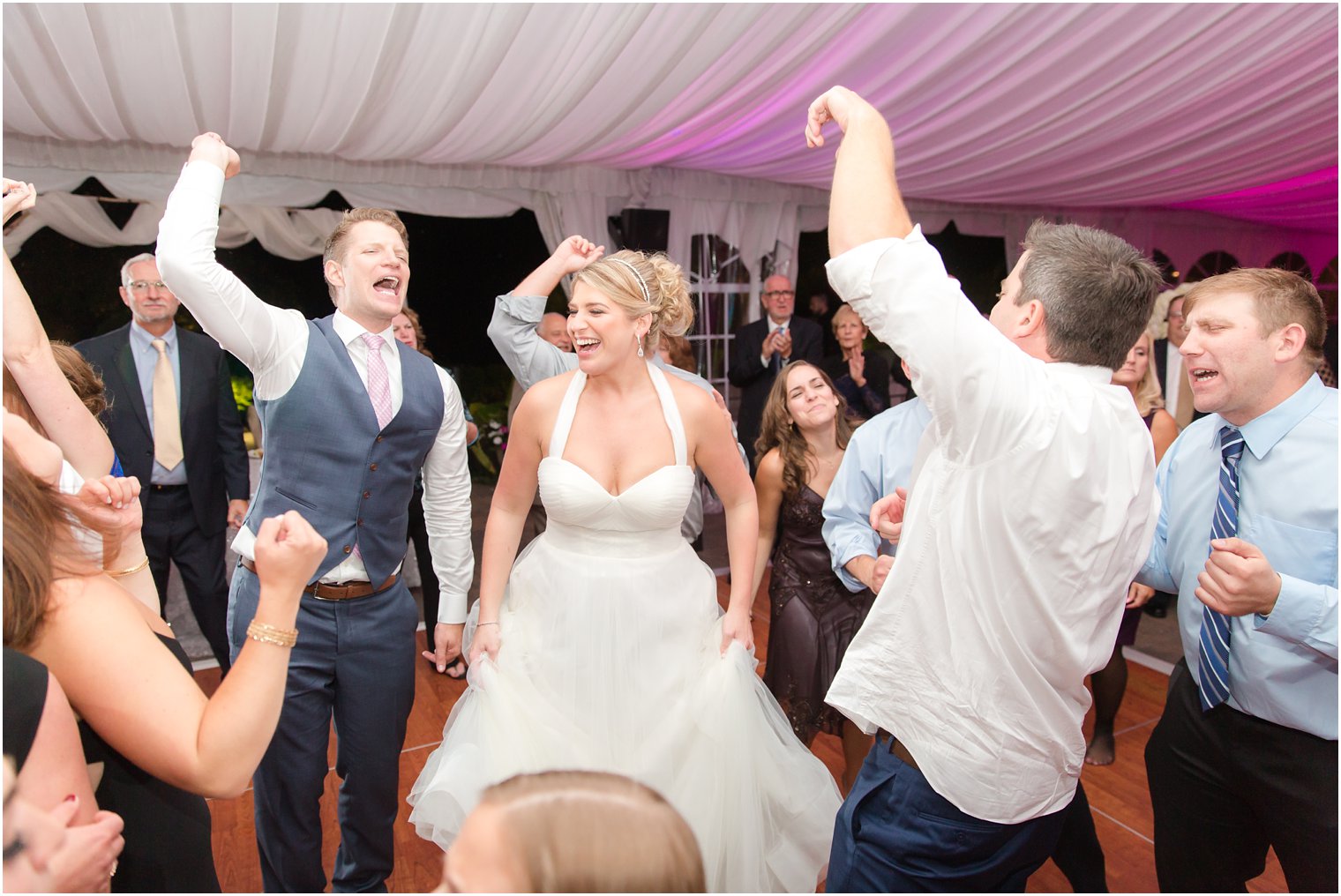 Bride and groom dancing at Windows on the Water at Frogbridge tented wedding reception