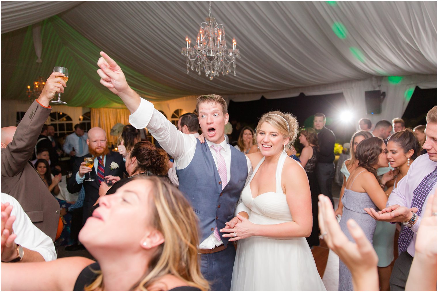 Documentary photo at Windows on the Water at Frogbridge tented wedding reception