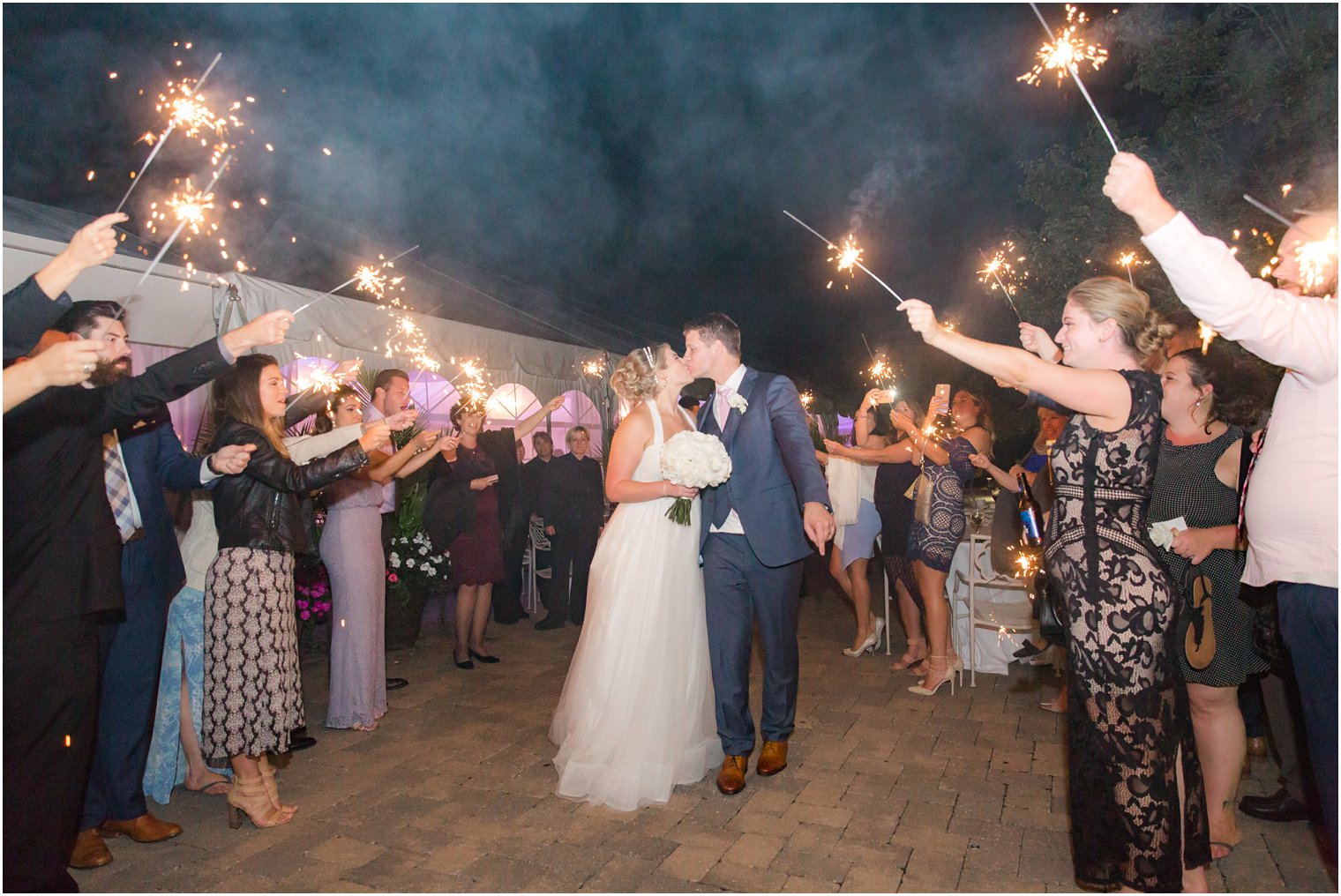 Sparkler exit at Windows on the Water at Frogbridge tented wedding reception