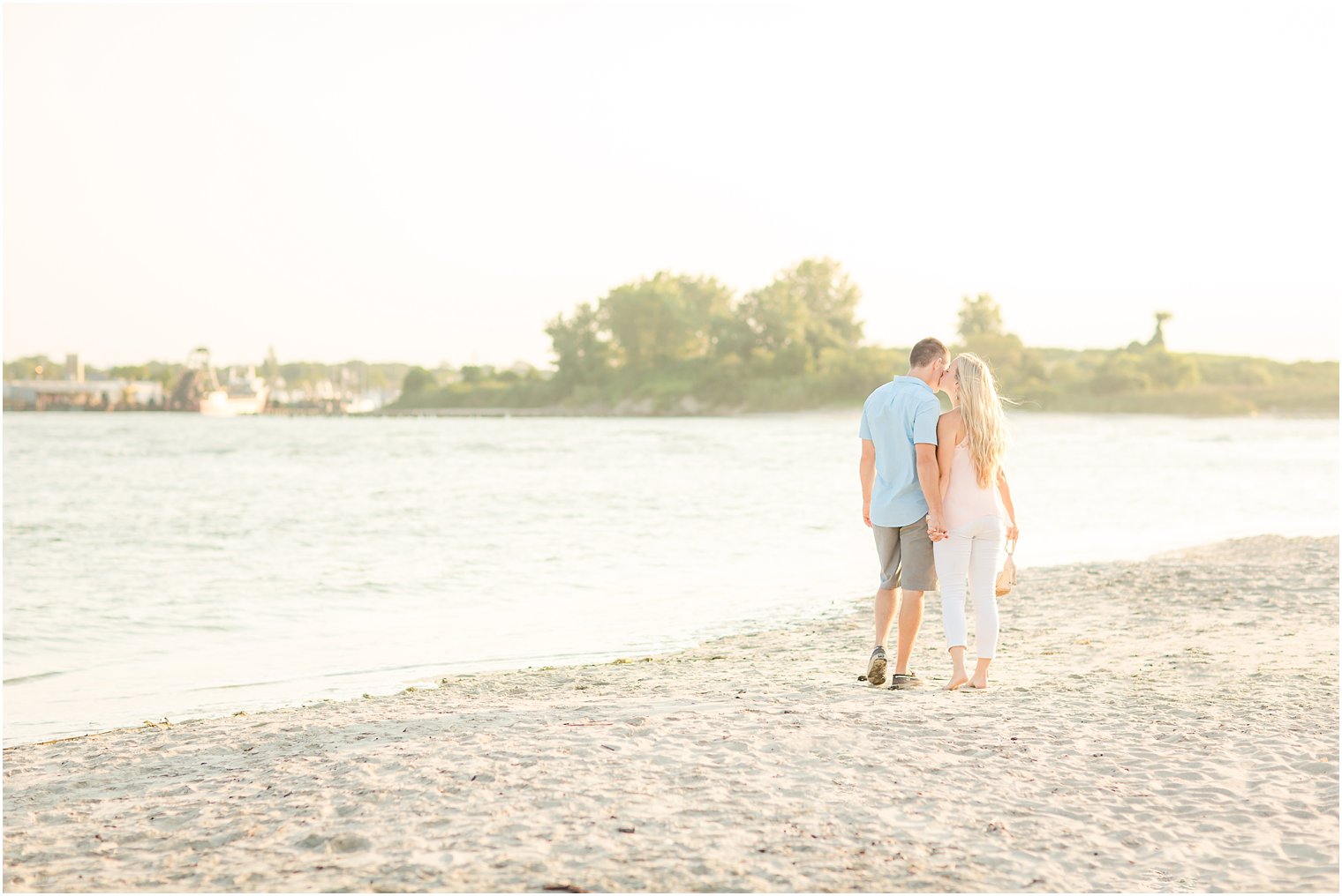 Romantic summer engagement photos at Manasquan Inlet