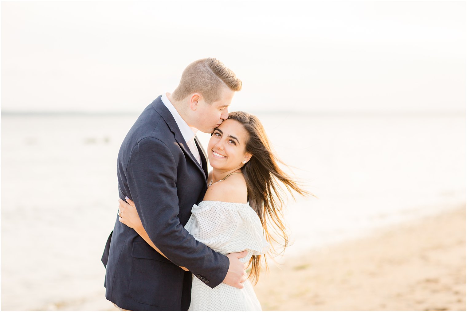 Temple kiss engagement photo posing idea