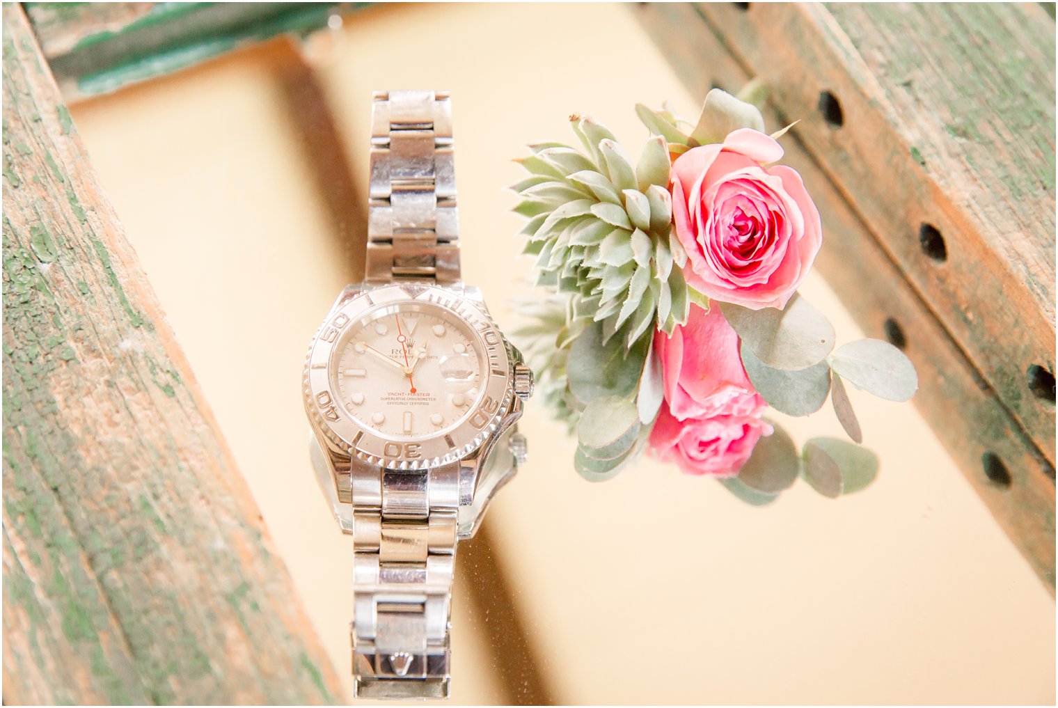 Groom boutonniere and watch by Idalia Photography