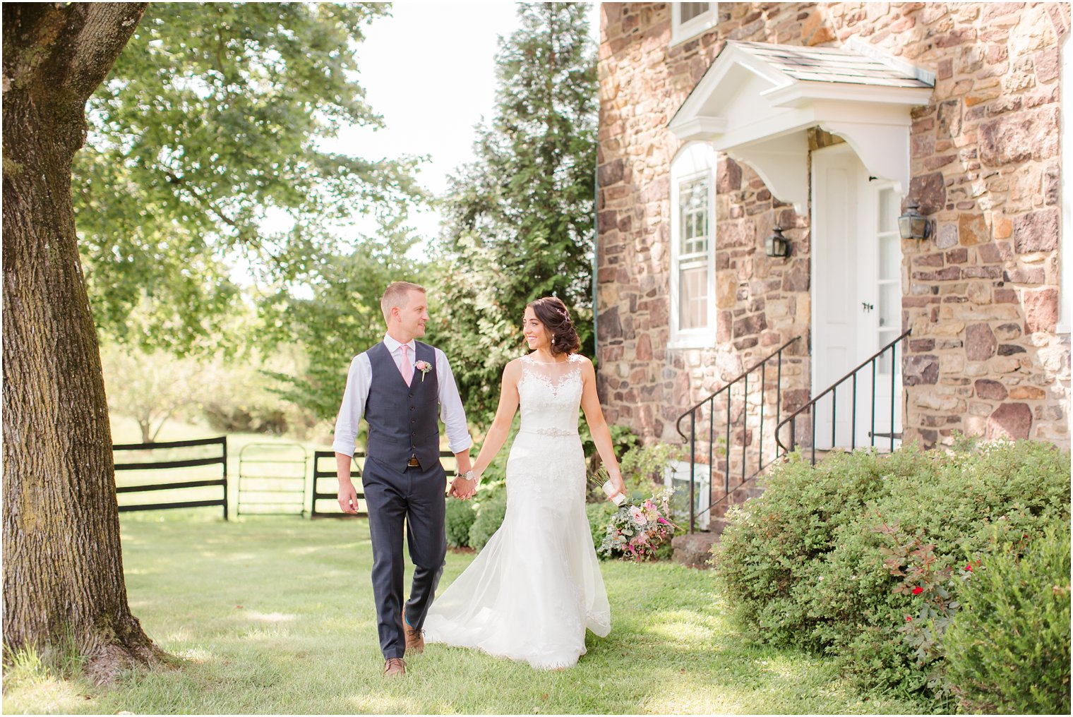 Bride and groom walking at Stone Rows Farm wedding