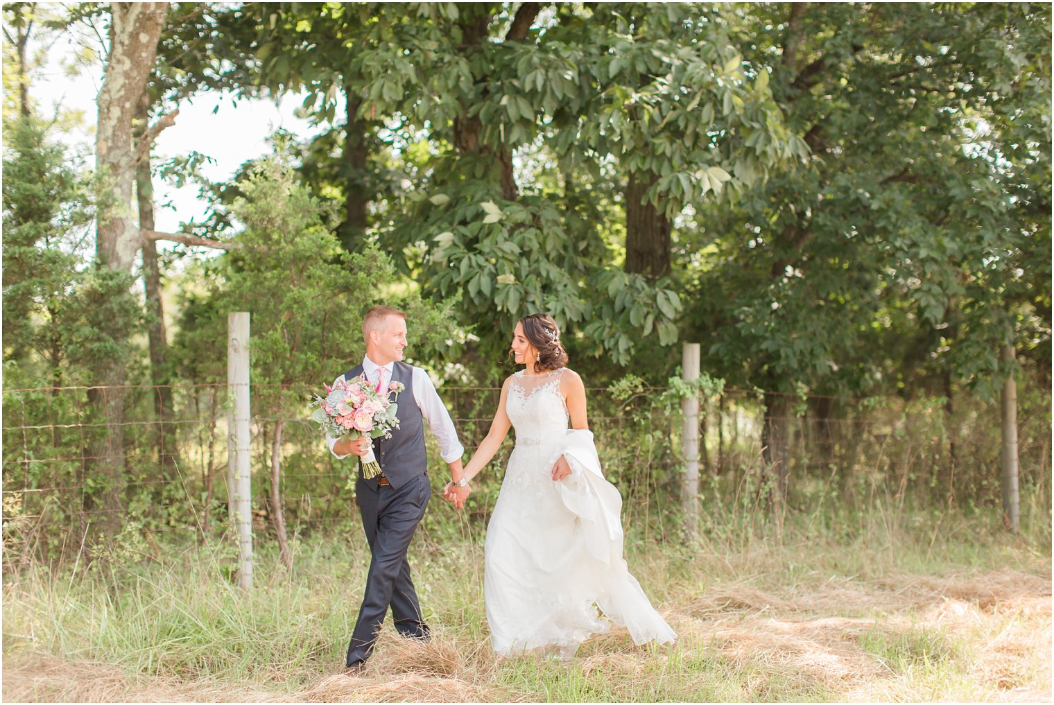 Walking photo of bride and groom at Stone Rows Farm
