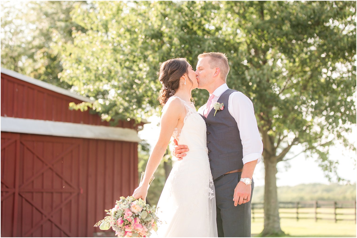 Kiss photo of bride and groom 