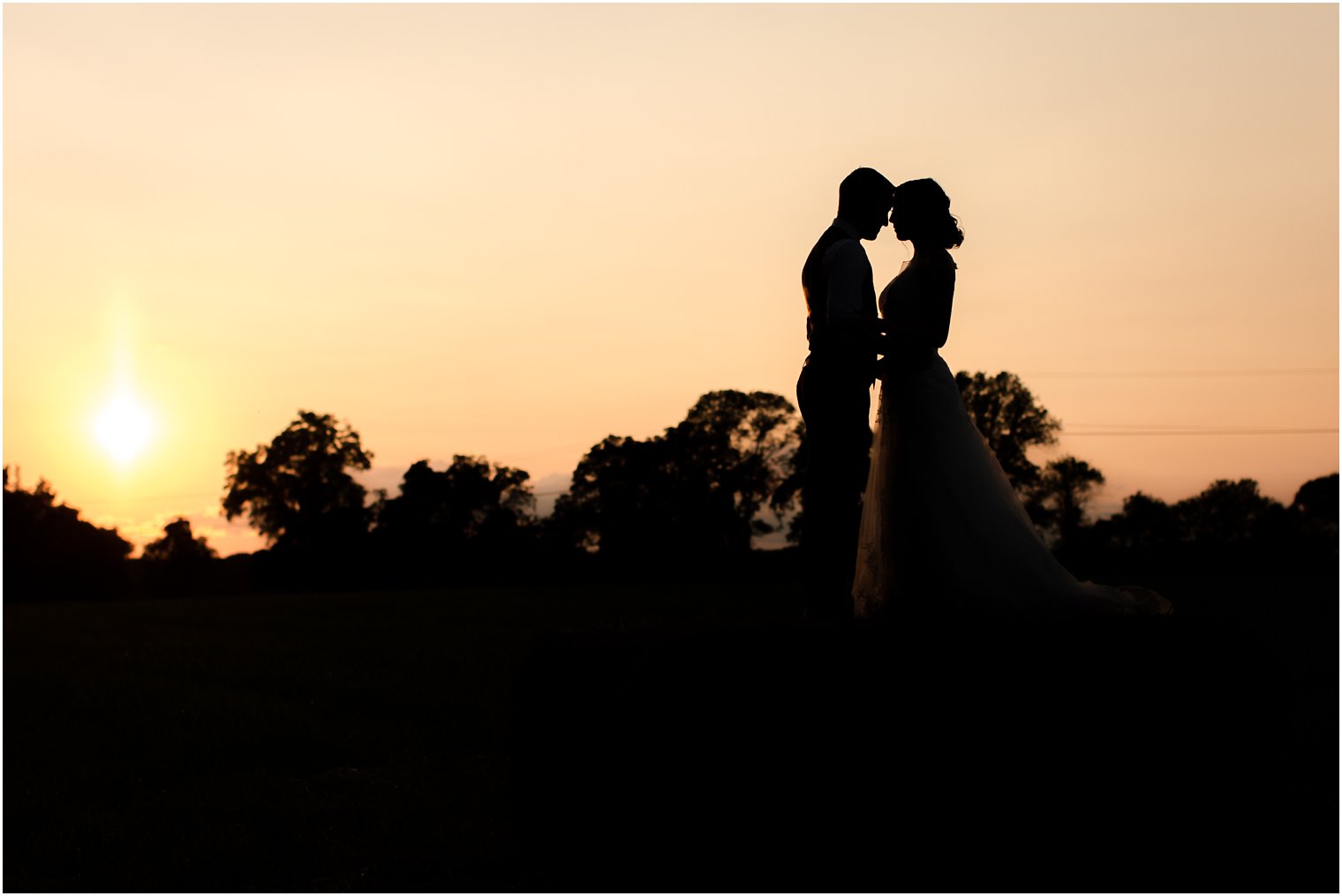 Bride and groom silhouette photo