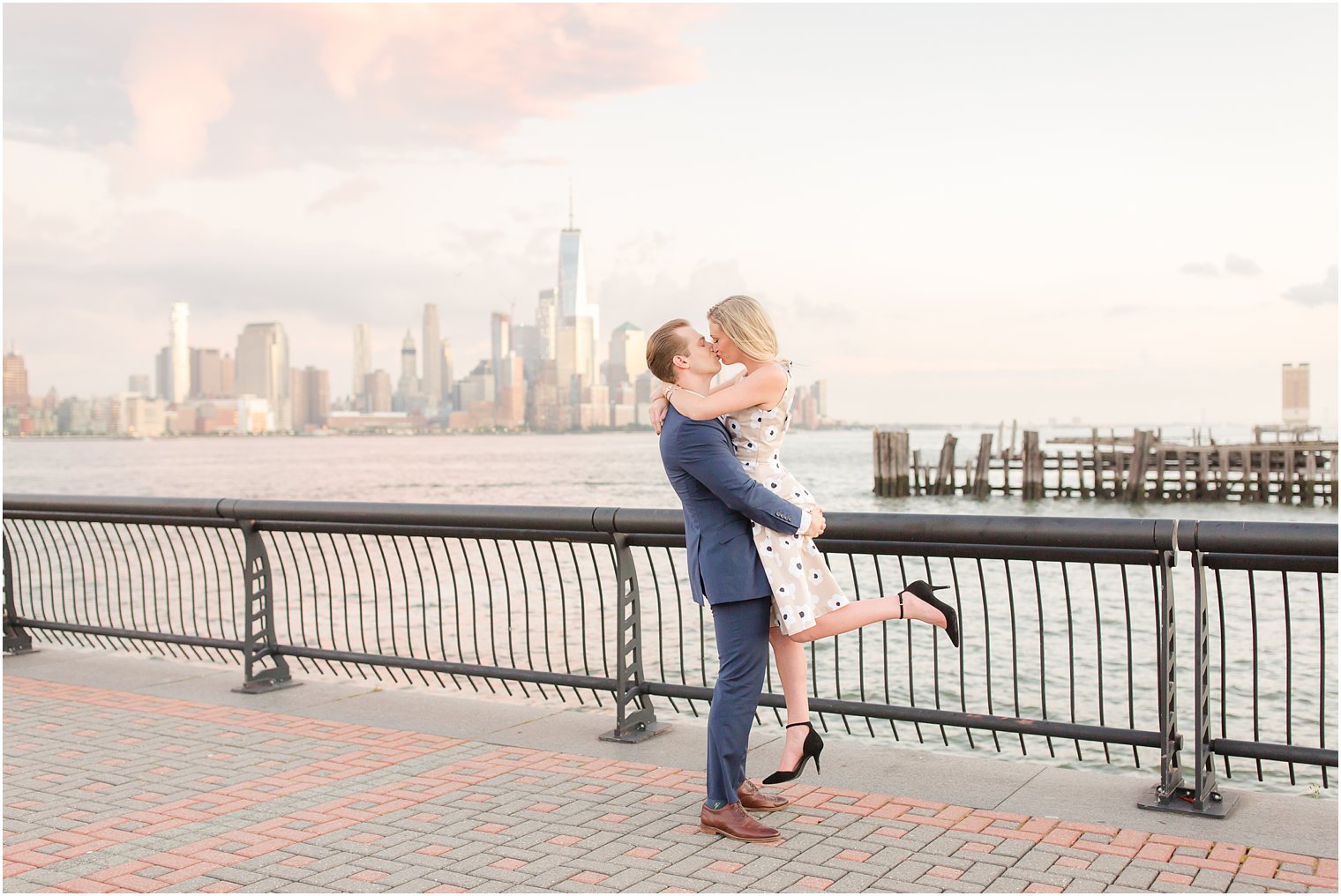 Romantic lift photo during engagement session