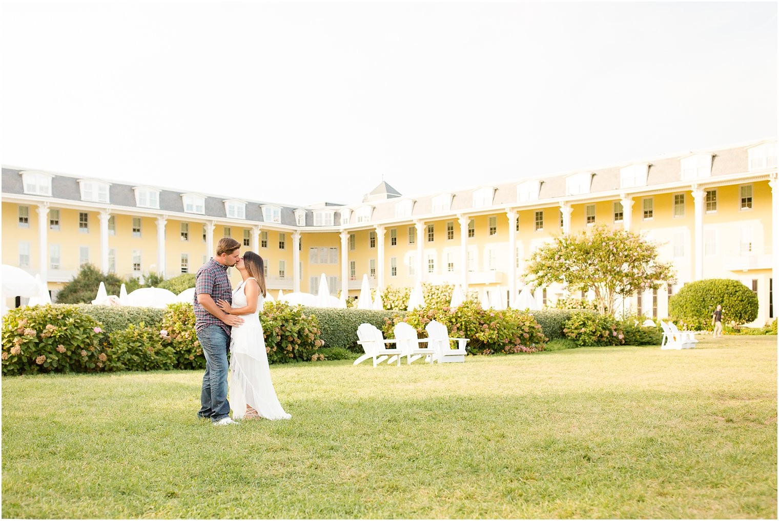 Congress Hall engagement photos on back lawn with lawn chairs